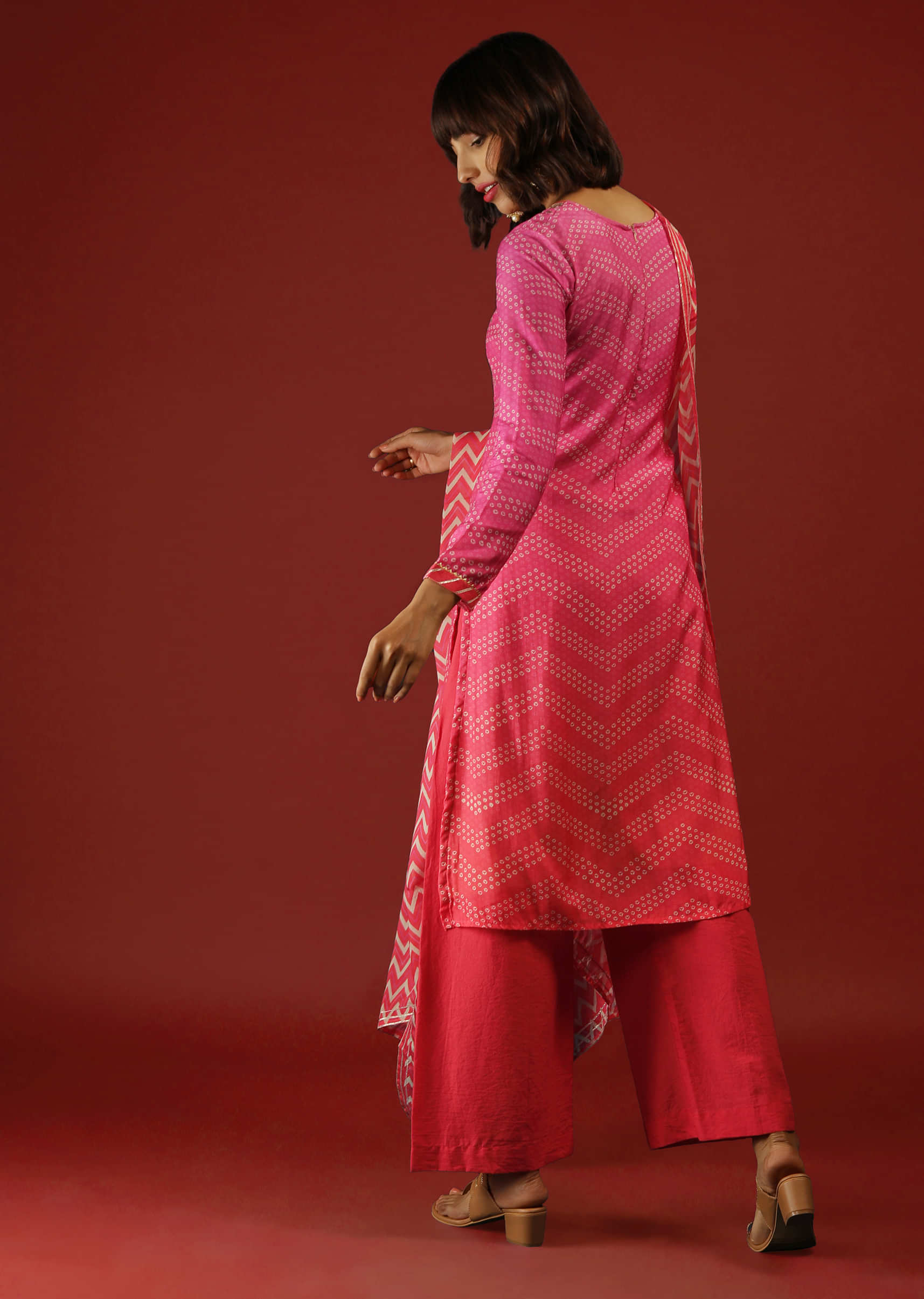 Magenta And Coral Pink Shaded Palazzo Suit With Bandhani Print And Chevron Dupatta  