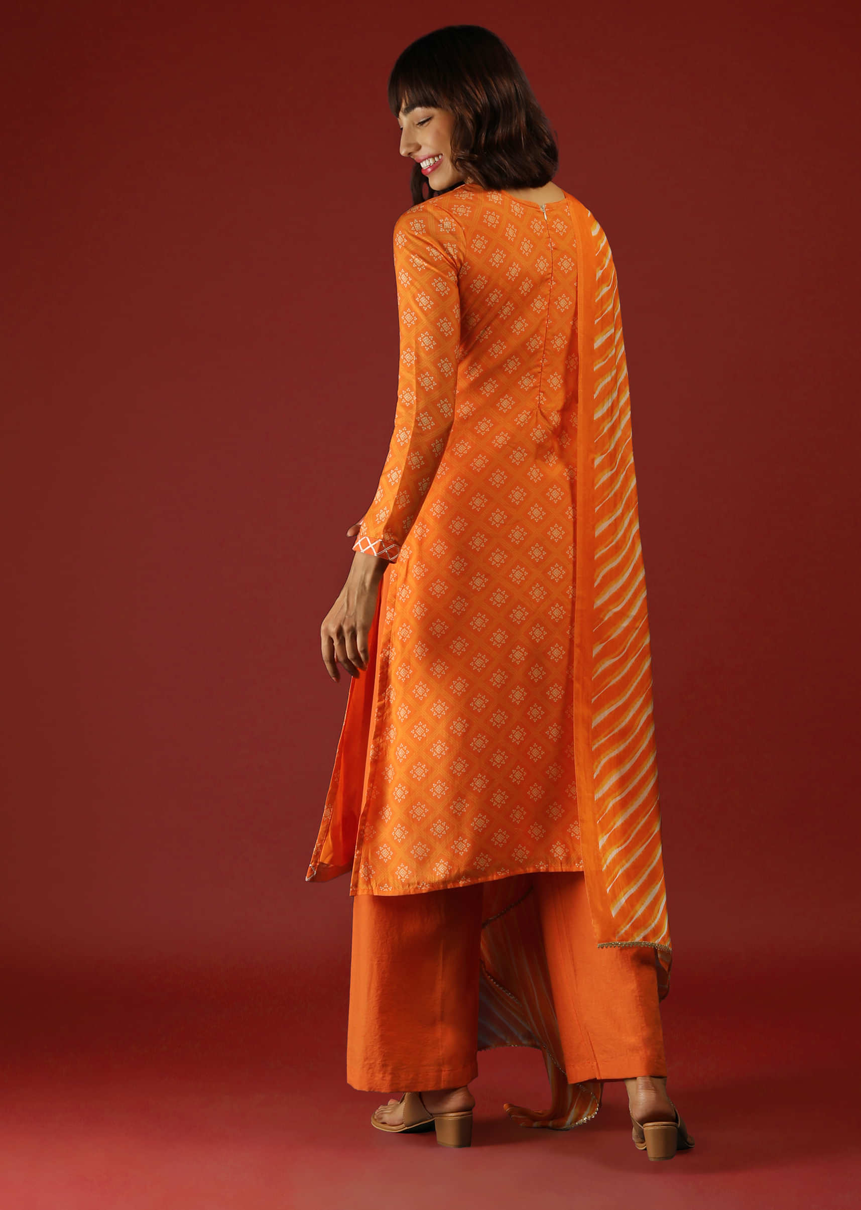 Orange Palazzo Suit In Cotton With Bandhani Print And Mirror Embroidery  
