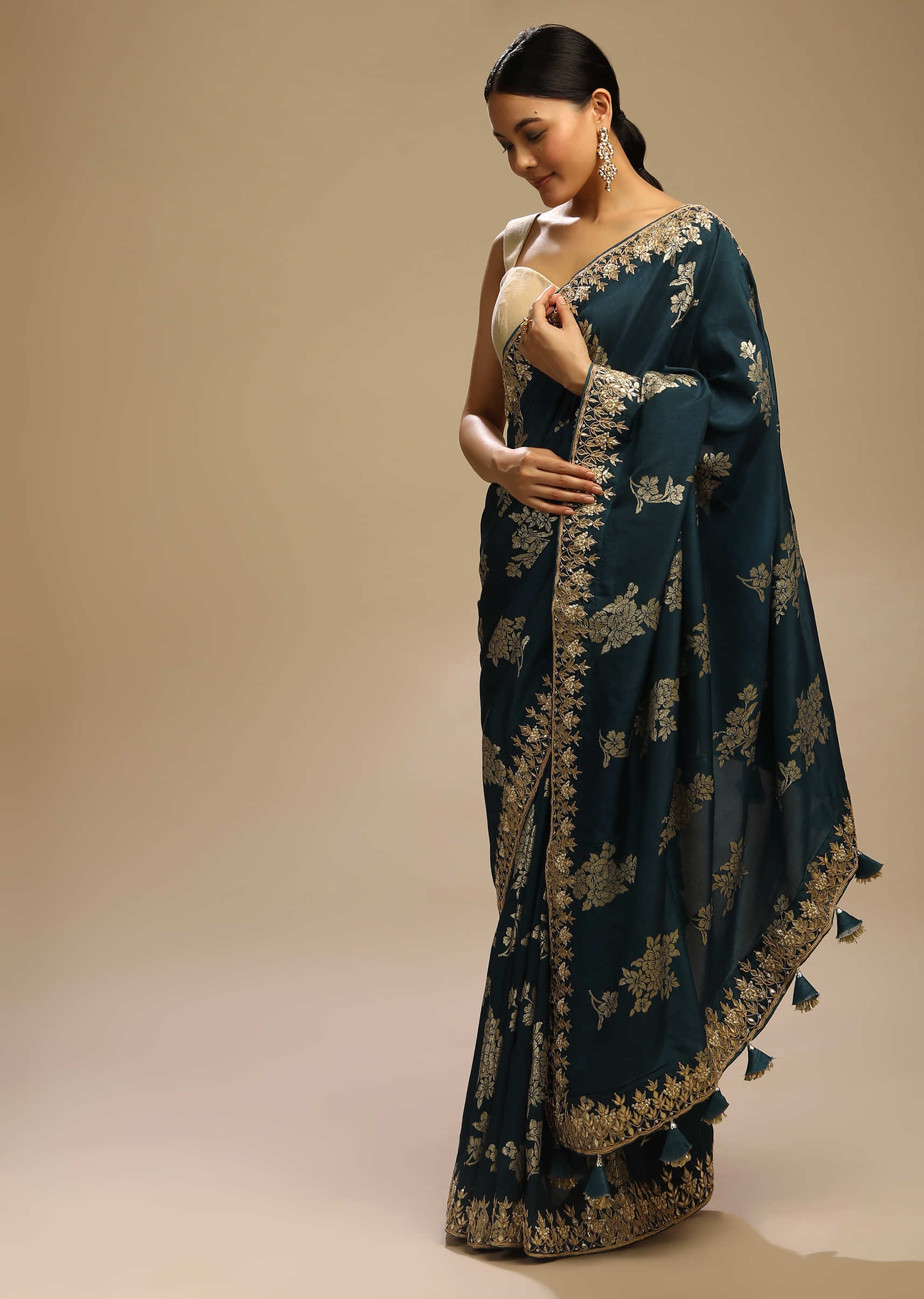 Peacock Blue Saree In Dupion Silk With Woven Floral Motifs And Gotta Embroidered Floral Border