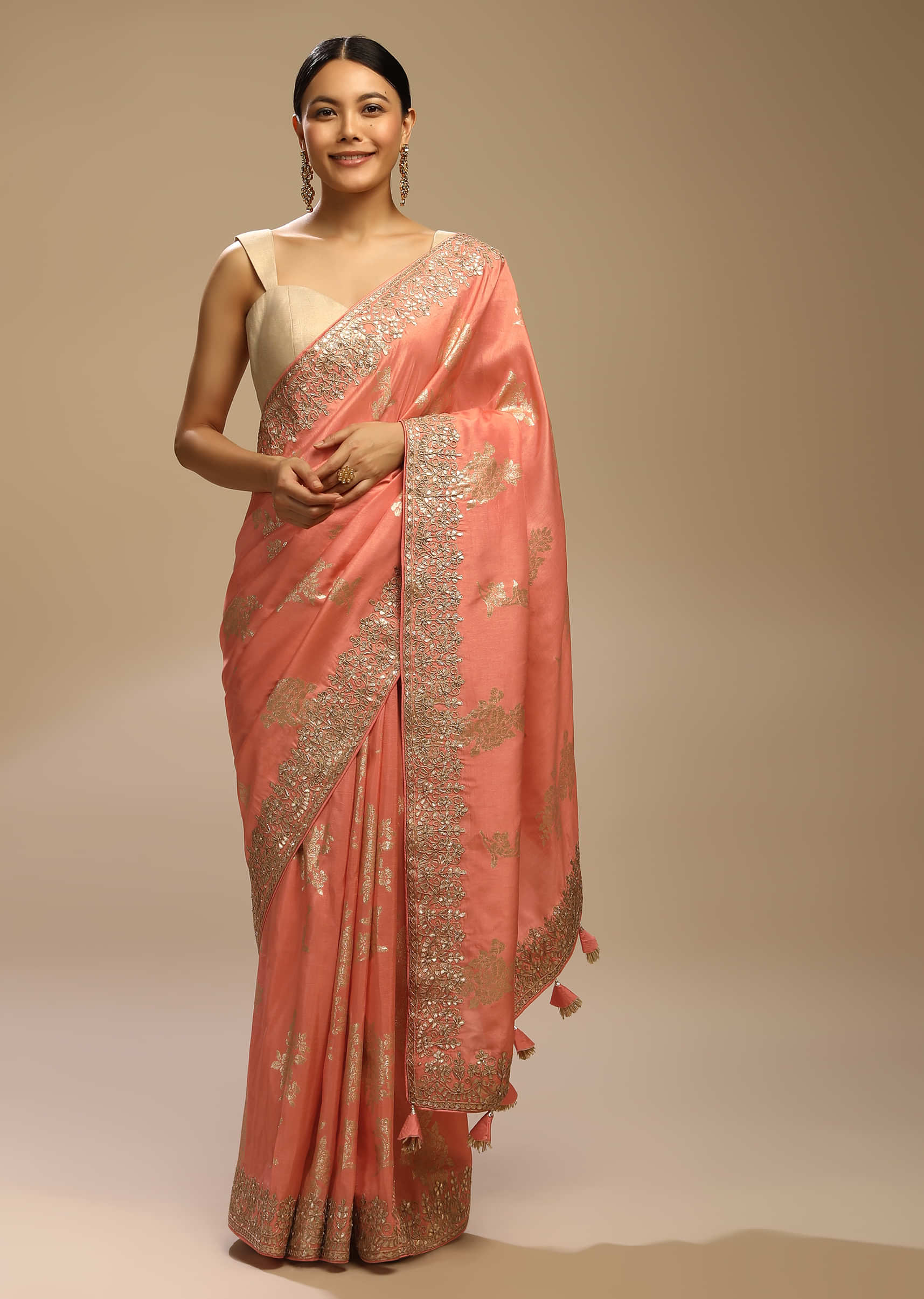 Peach Amber Saree In Dupion Silk With Woven Floral Motifs And Gotta Embroidered Floral Border