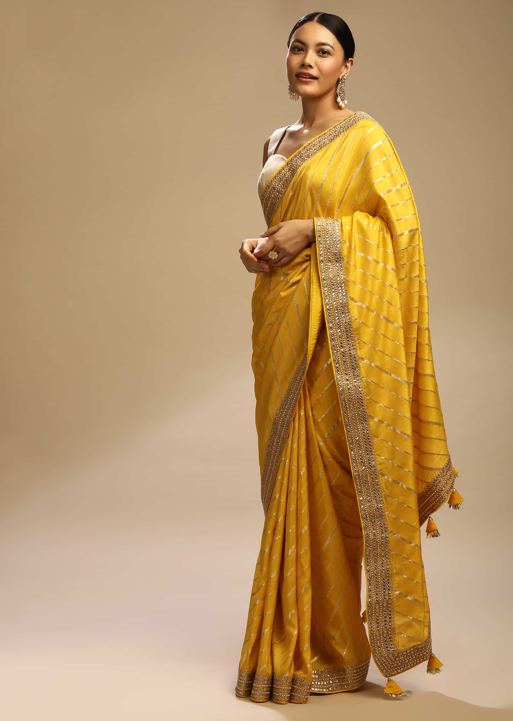 Dandelion Yellow Saree In Dupion Silk With Woven Diagonal Stripes And Gotta Embroidered Border