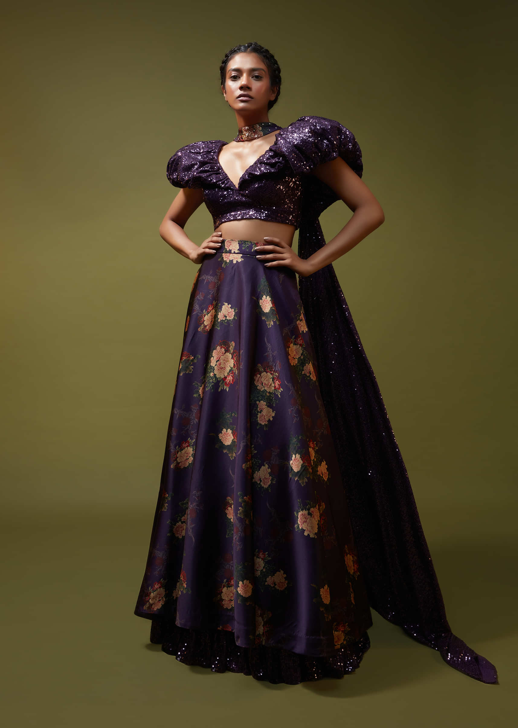 Jewel Purple Lehenga In Floral Printed Satin With A Sequins Crop Top Designed With An Elaborate Puff On The Shoulder And Neckline 
