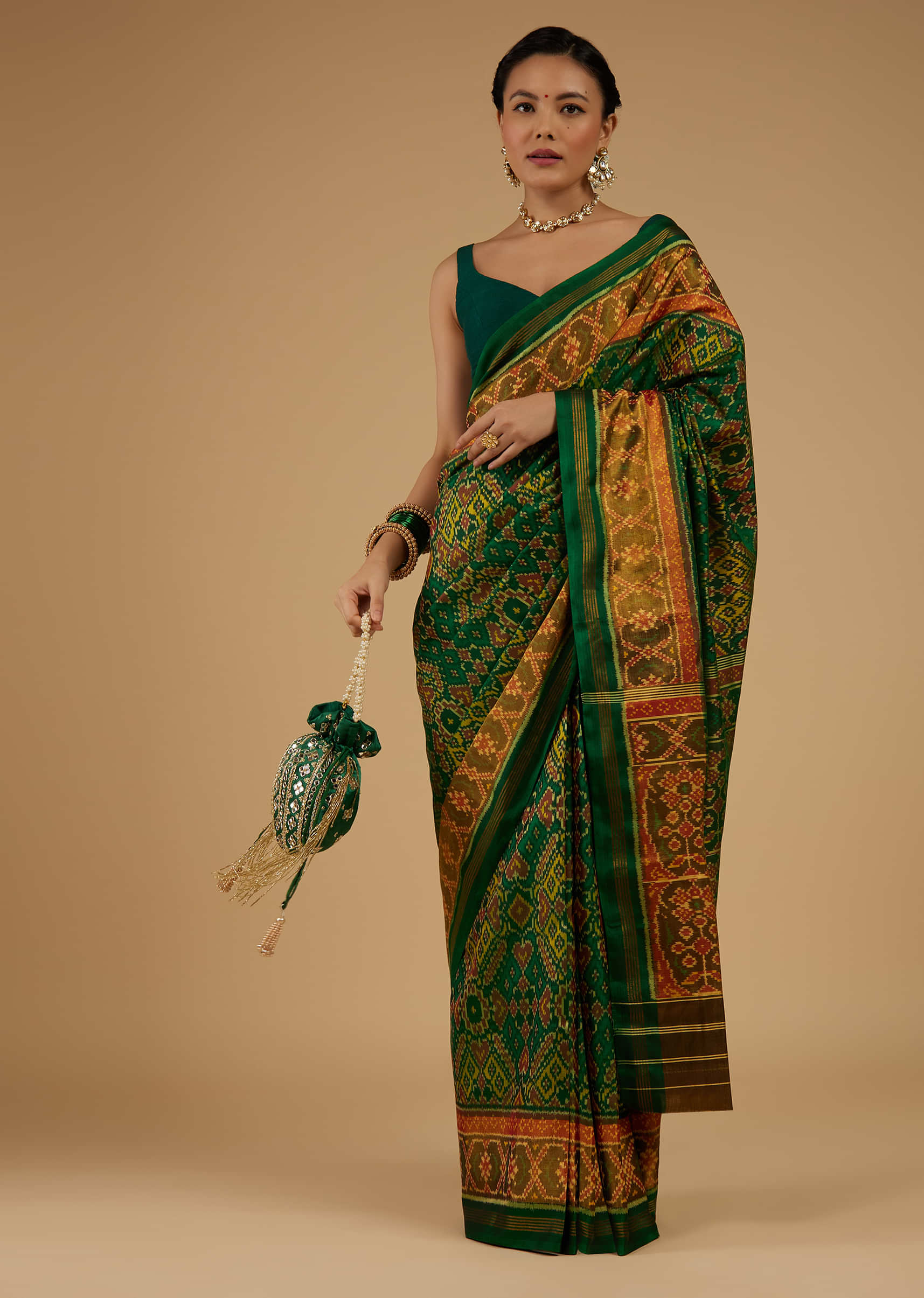 Kalki Alpine Green Saree In Silk With Ikat Weave Patola Work