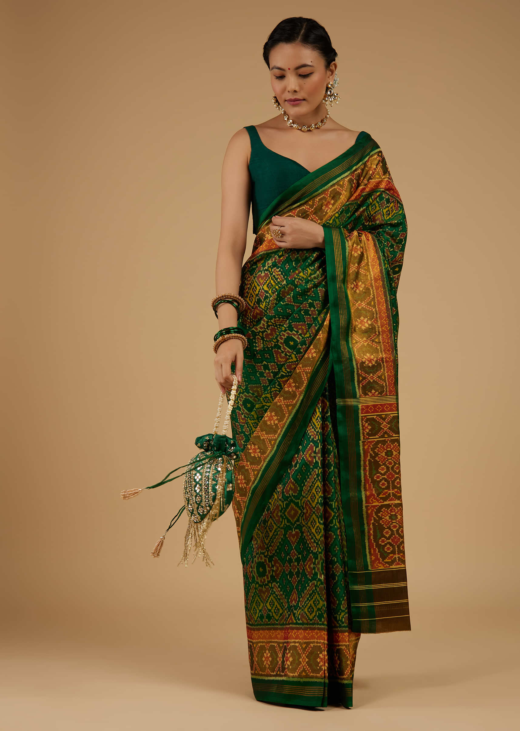 Jade Green Saree In Silk With Ikat Weave Patola Work