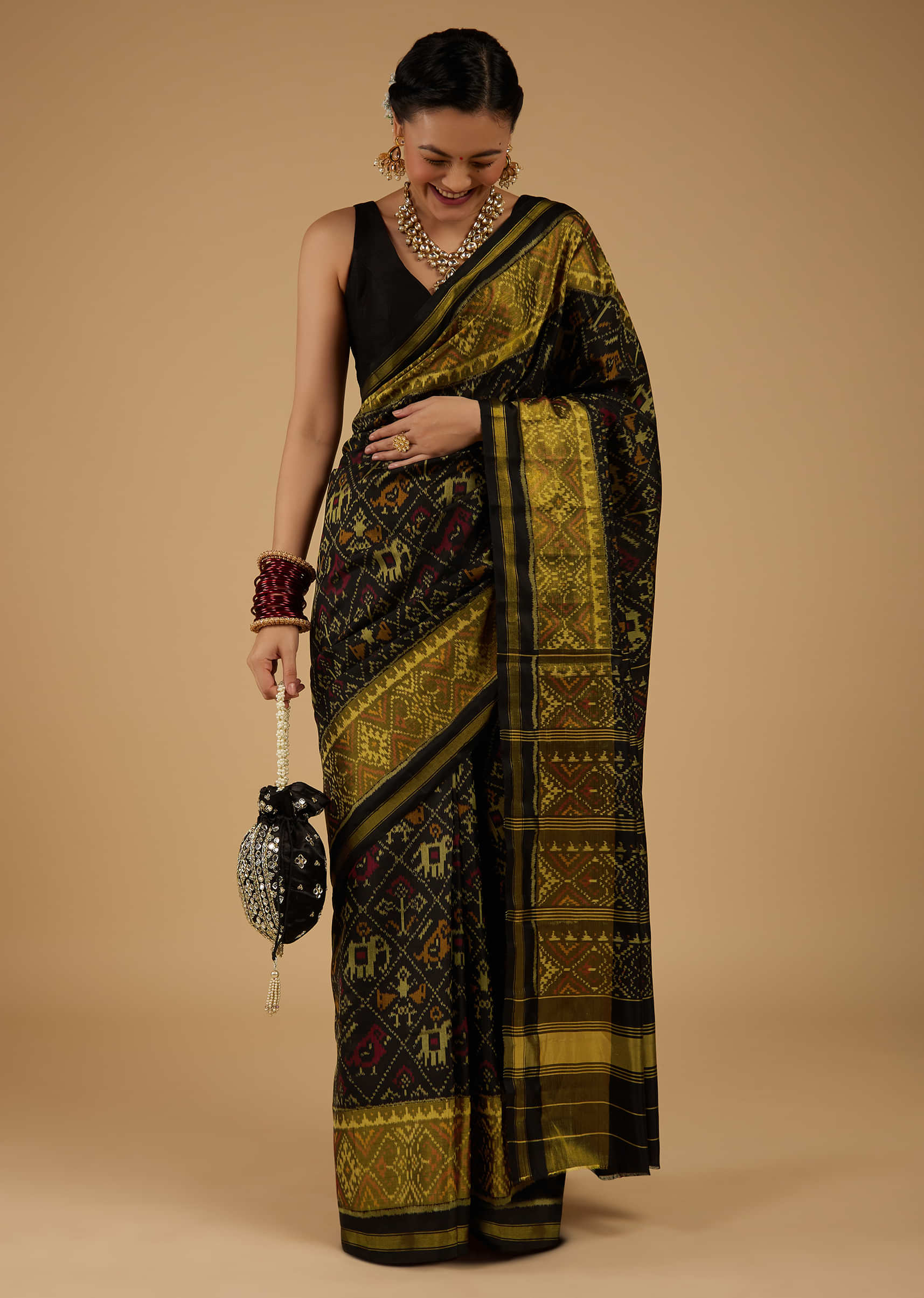 Kalki Antique Moss Green & Black Saree In Pure Silk Tissue With Ikat Weave & Zari Patola Work