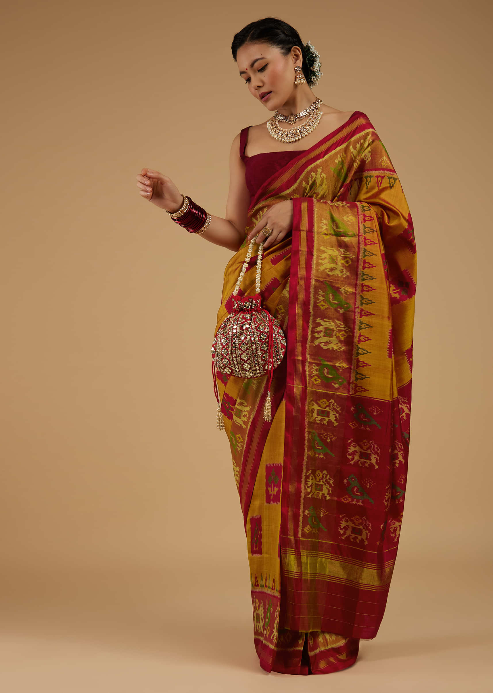 Ocher Yellow Saree In Silk With Ikat Weave Patola Work