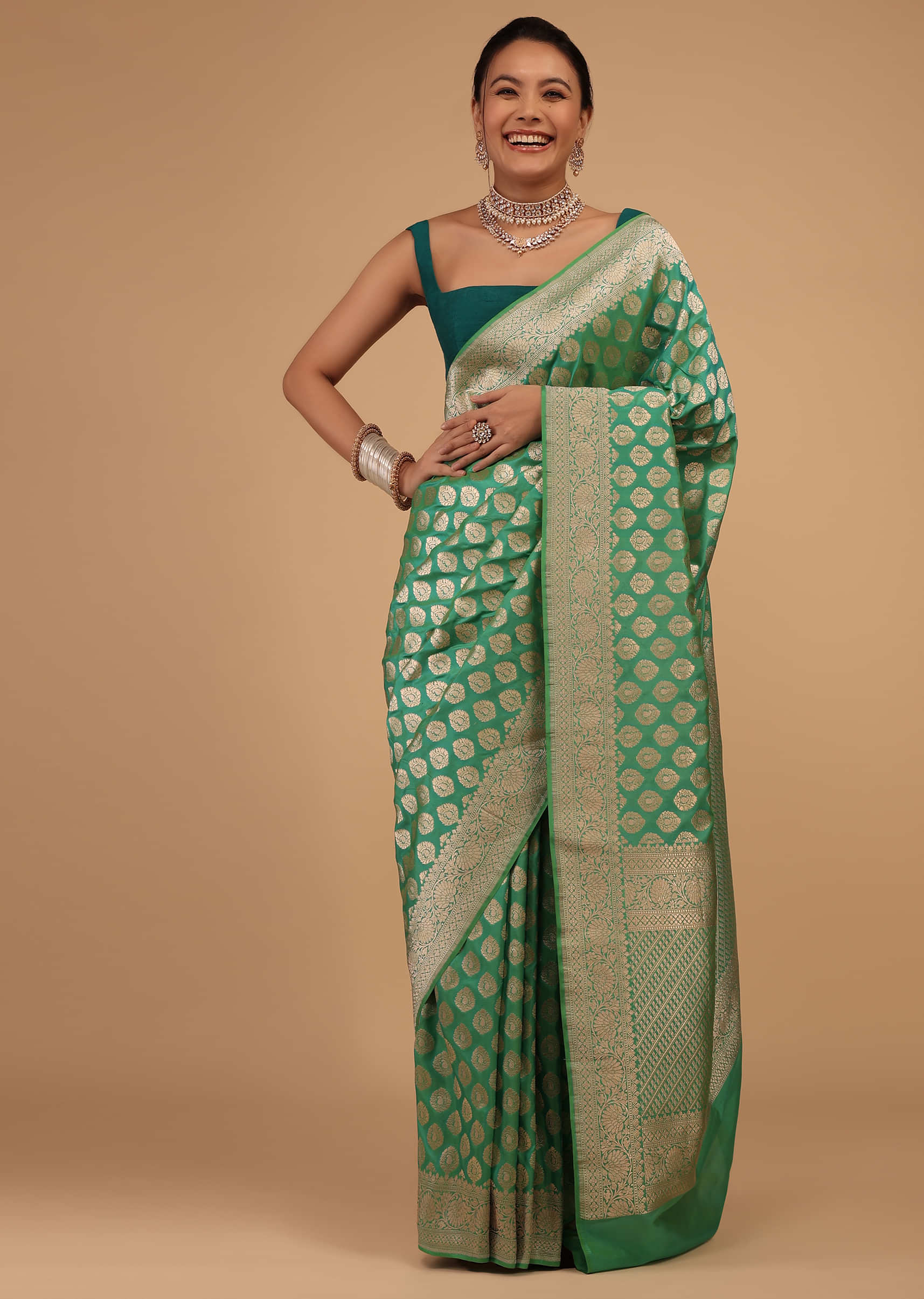 Kalki Atlantis Green Saree In Pure Banarasi Silk With A Summer Green Luminous Shade And Upada Zari Weave Floral Butti Work