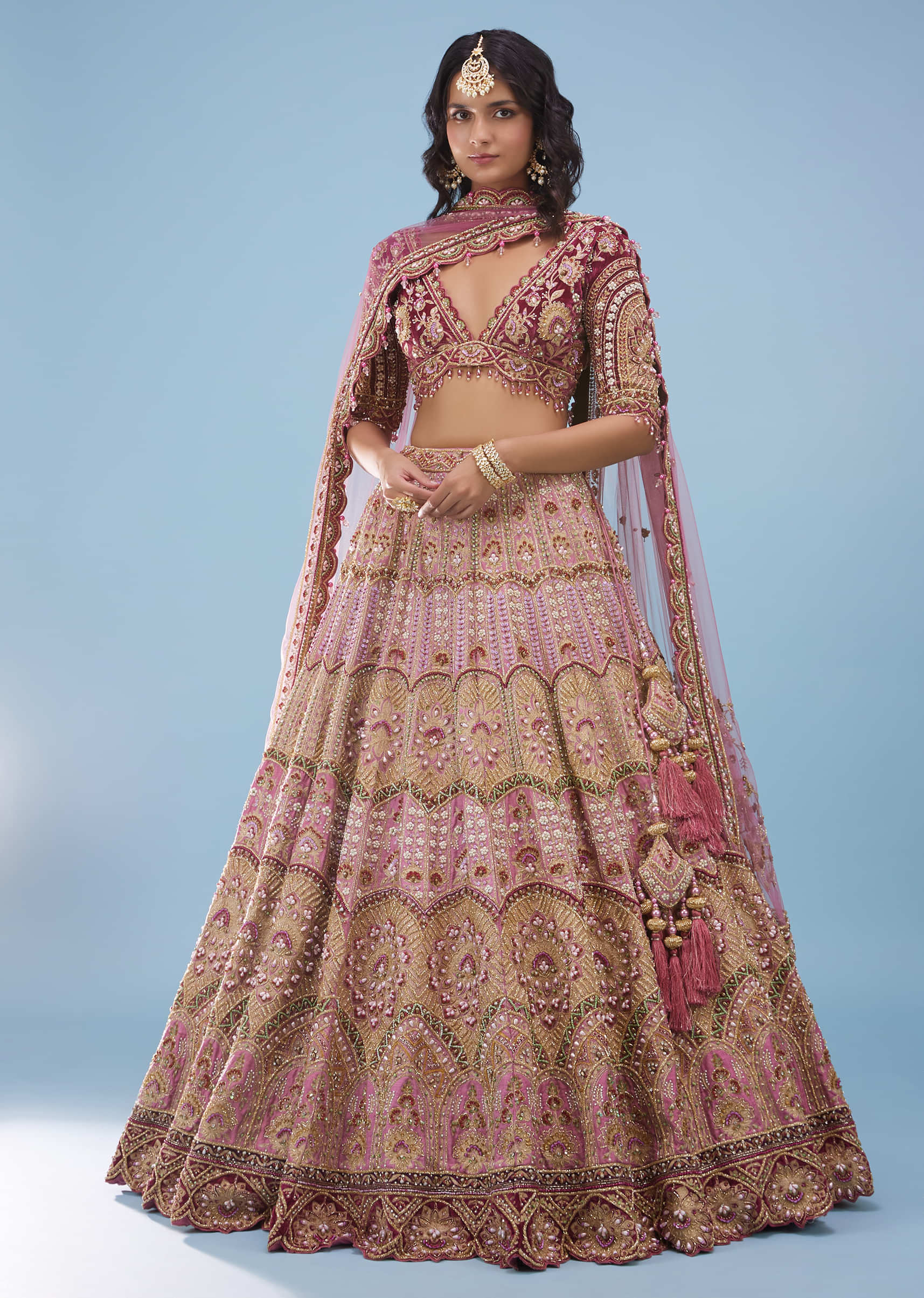 Kalki Cashmere Rose Pink Junoesque Bridal Lehenga In Raw Silk With Heavy Embroidery - NOOR 2022