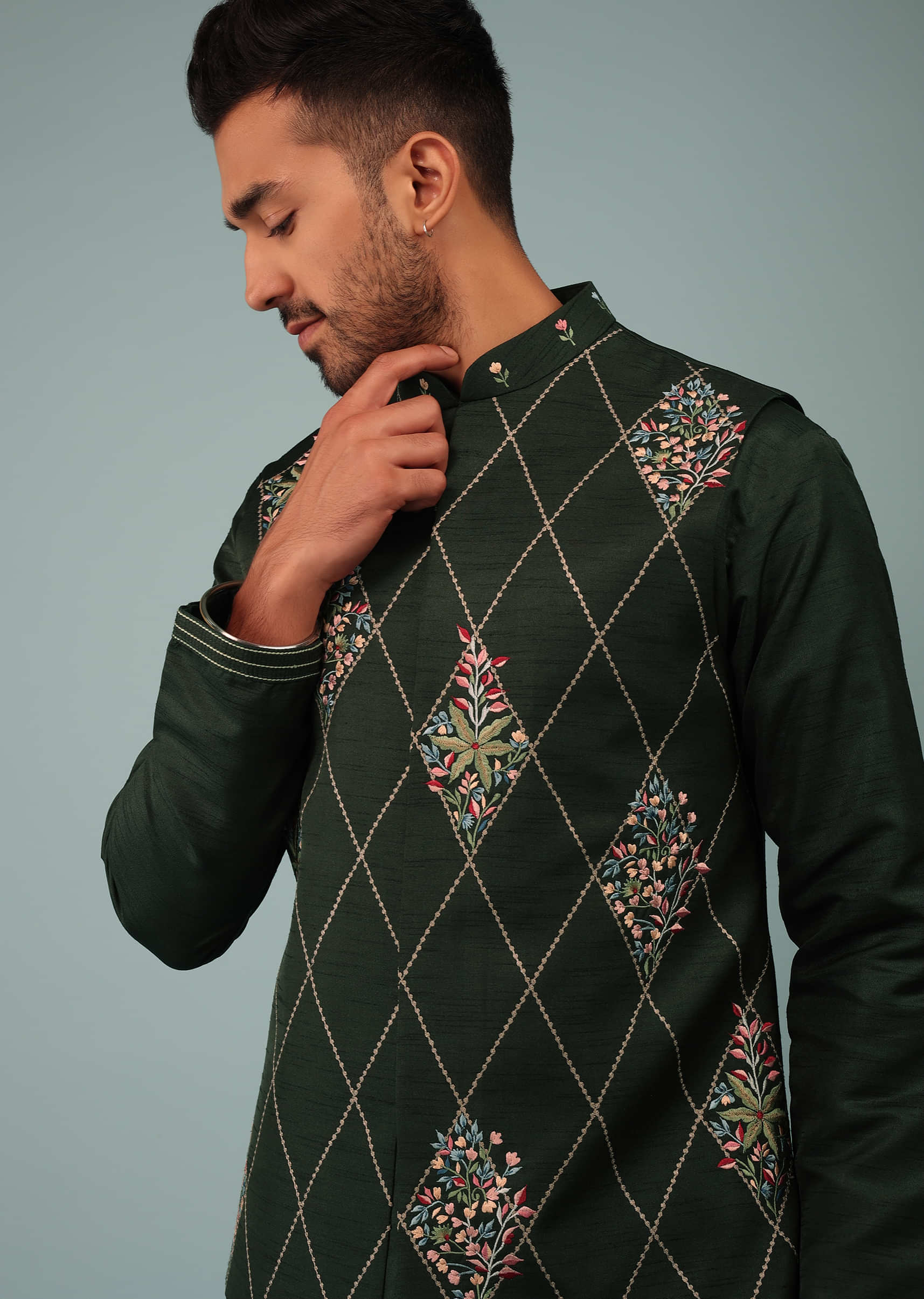 Deep Green Bandi Jacket Set In Raw Silk With Multicolor Floral Butti & Aari Embroidery