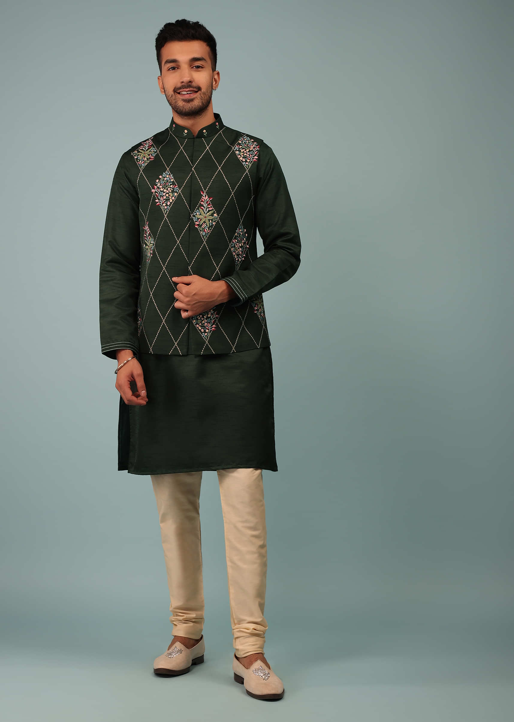 Deep Green Bandi Jacket Set In Raw Silk With Multicolor Floral Butti & Aari Embroidery