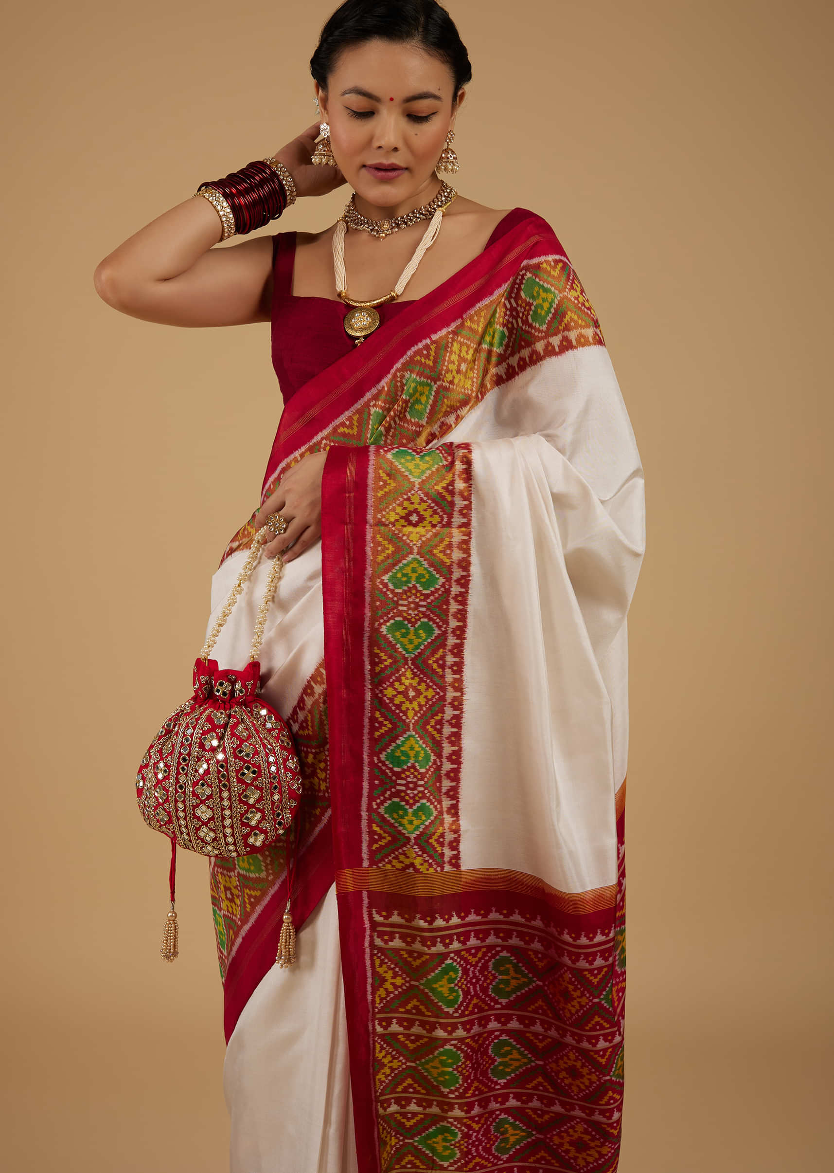 Pearl White Saree In Silk With Ikat Weave Patola Work
