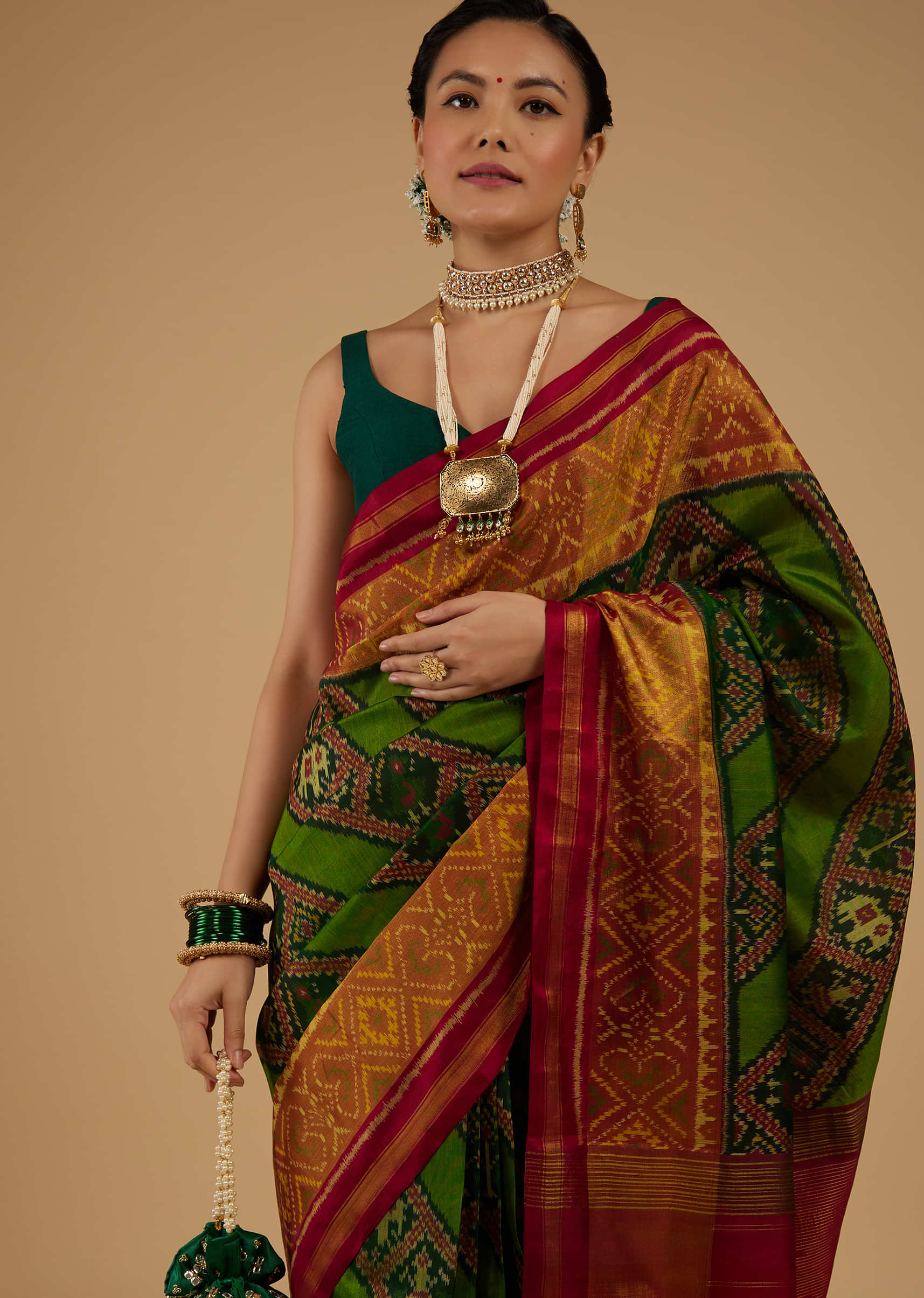 Forest Green Saree In Silk With Ikat Weave Patola Work