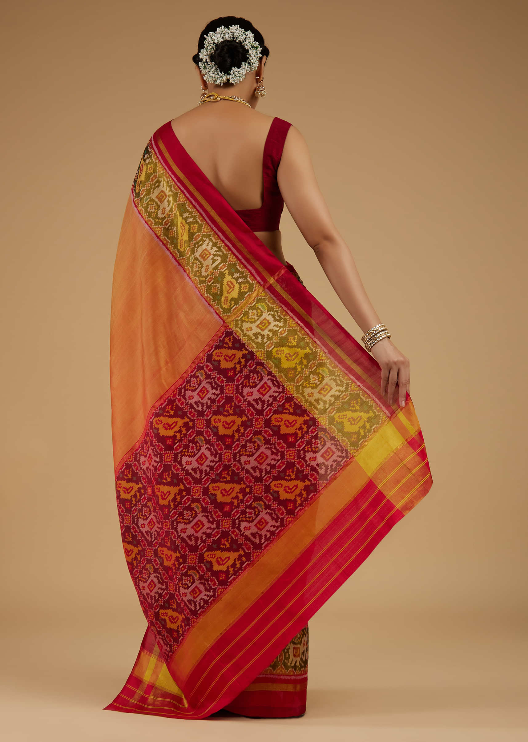 Carrot Orange Saree In Silk With Ikat Weave Patola Work