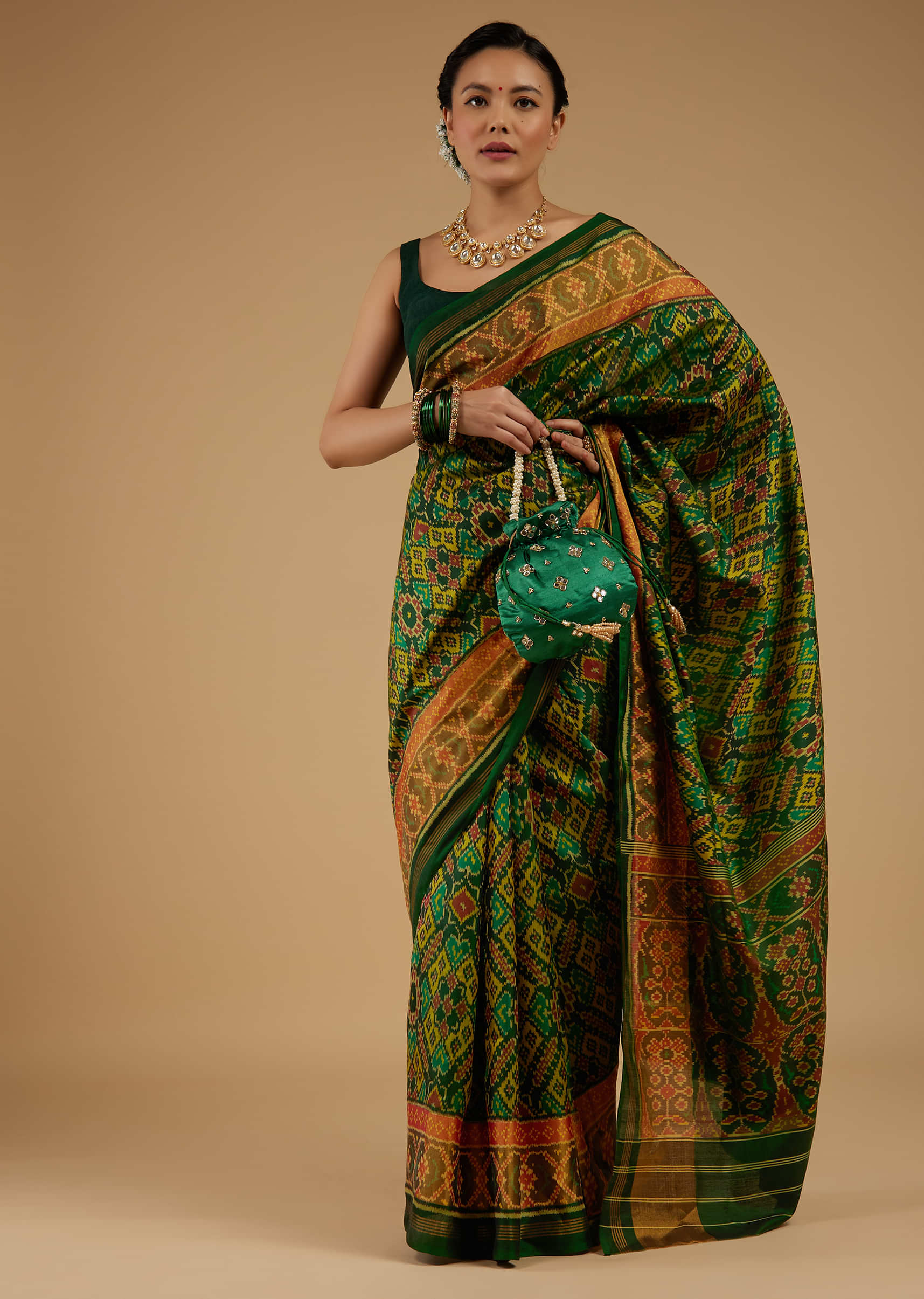 Kalki Sycamore Green Saree In Silk With Ikat Weave Patola Work