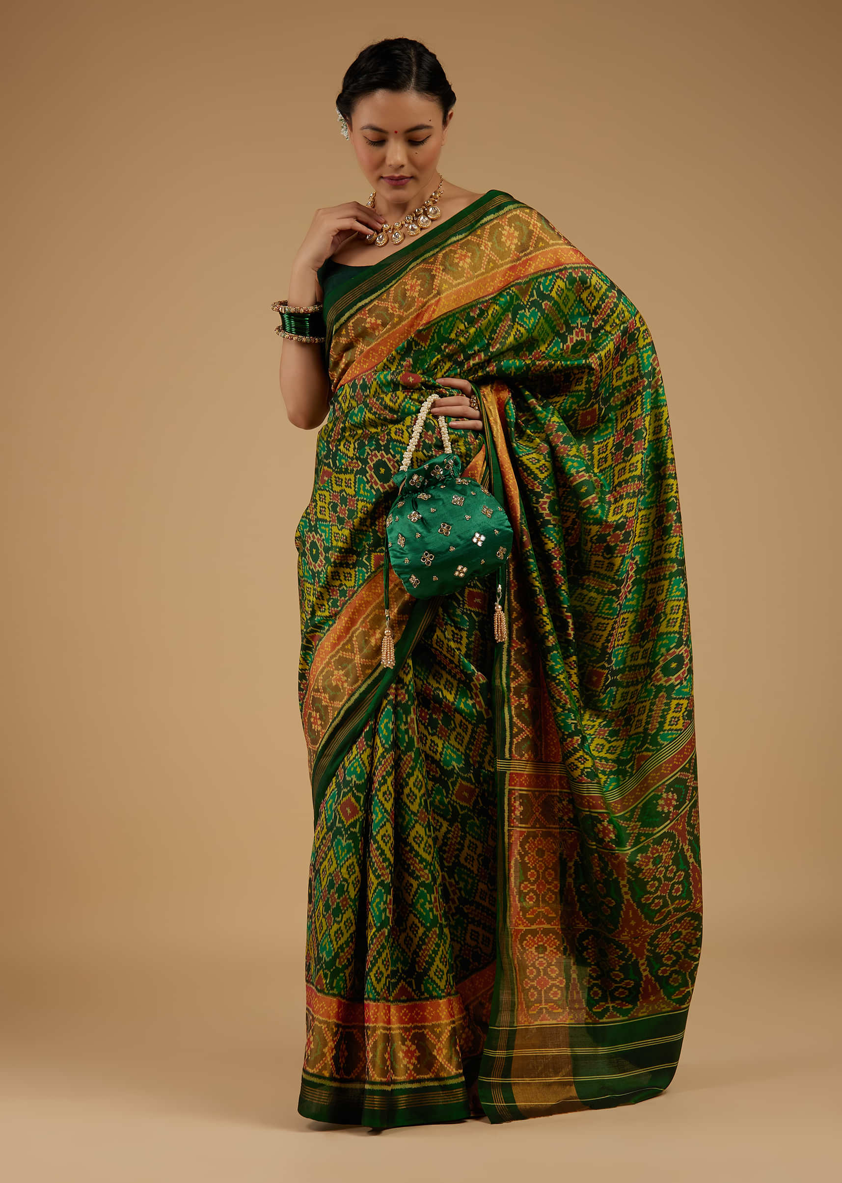 Forest Green Saree In Silk With Ikat Weave Patola Work