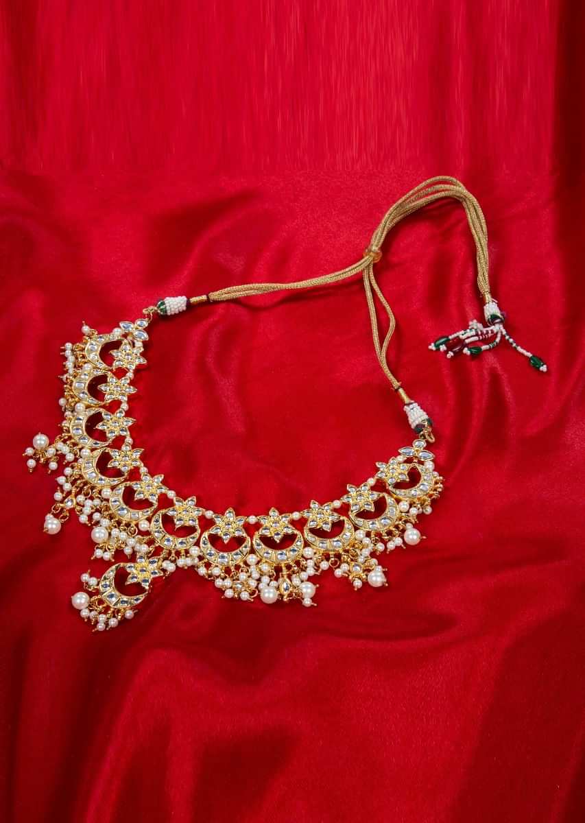 Kundan and pearl studded collar necklace in moon and star motifs only on kalki
