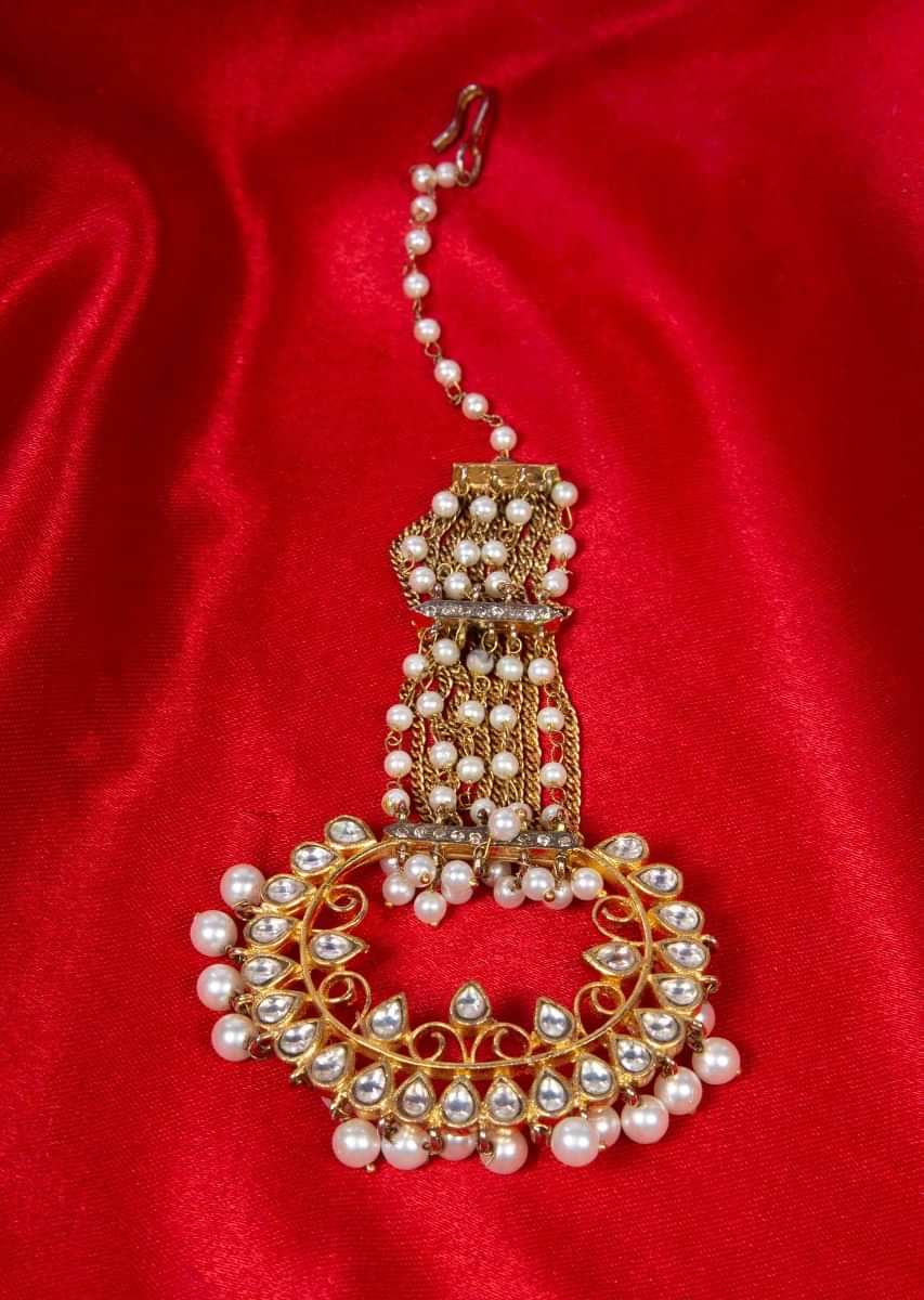 Kundan and pearl studded multi string maang tikka designed with cut work and moti drops only on Kalki