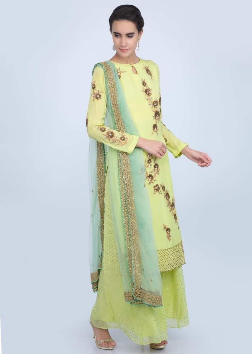 Lemon green multi color floral embroidered palazzo suit set with green net dupatta only on Kalki
