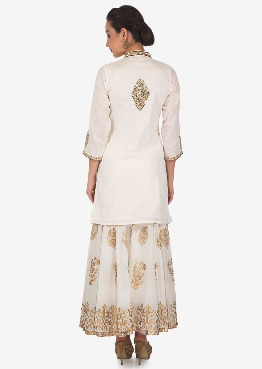 Cream Straight Sharara Suit With Kundan And Zari Embroidery All Over Online - Kalki Fashion