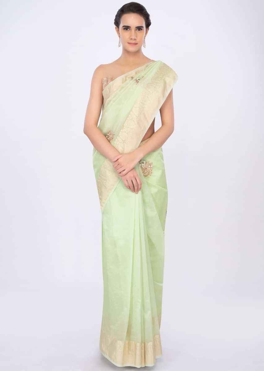 Light green organza saree with embroidered butti only on kalki