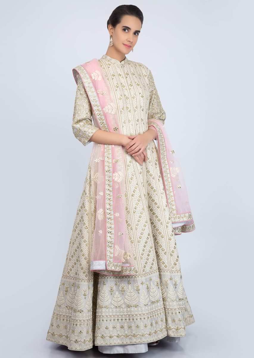 Light Green Jacket With Thread Jaal Embroidery Paired With Grey Lehenga And Pink Net Dupatta Online - Kalki Fashion