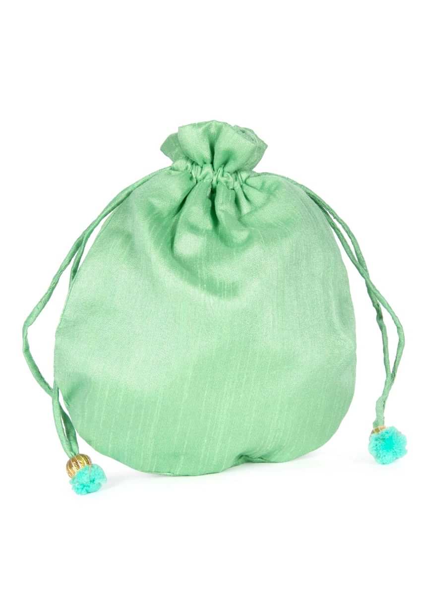 Light green velvet potli bag embellished in gotta patch and moti kalki