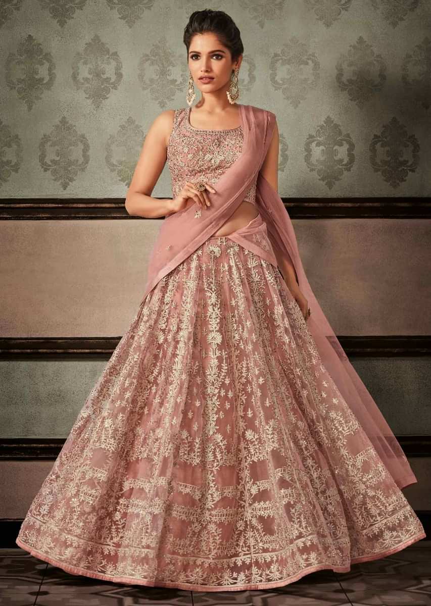 Light peach lehenga set in net with cod thread and sequin embroidery