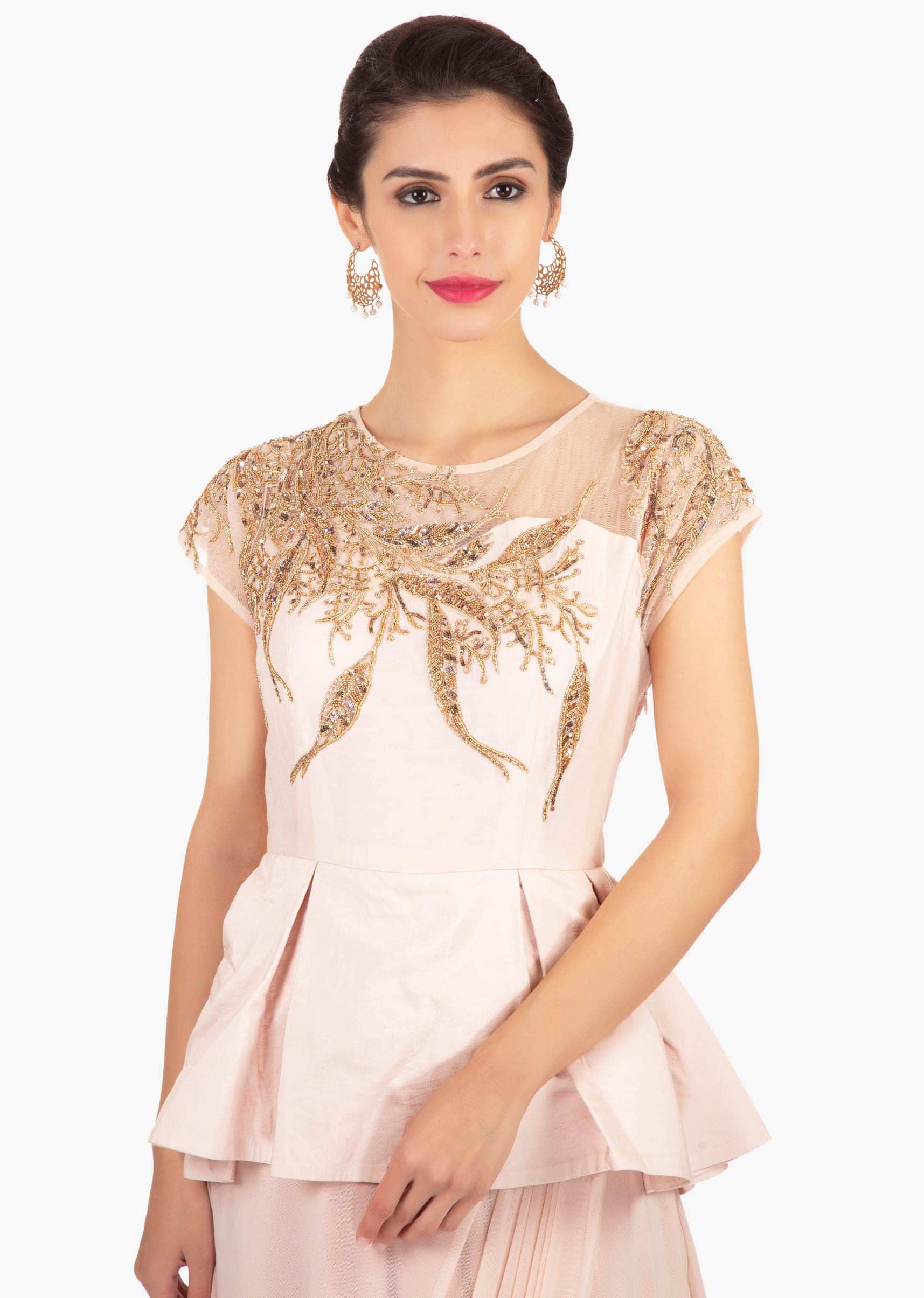 Light peach soft net gown with peplum style bodice