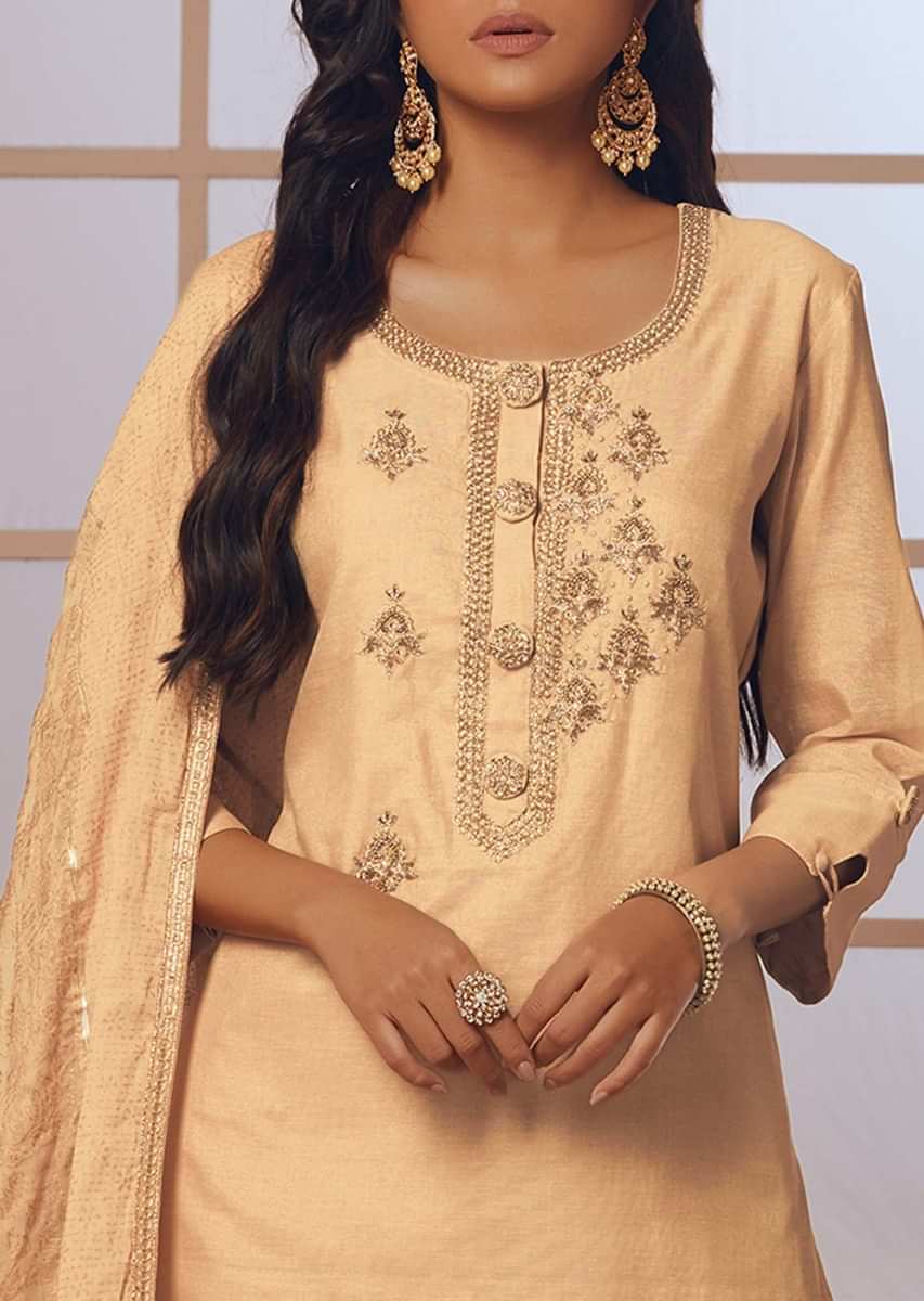 Light peach straight palazzo suit with embroidered butti and fancy buttons