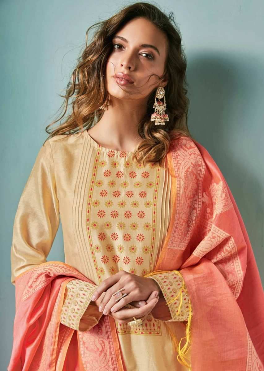 Light peach unstitched suit adorn in geometric motif printed placket matched with peach dupatta