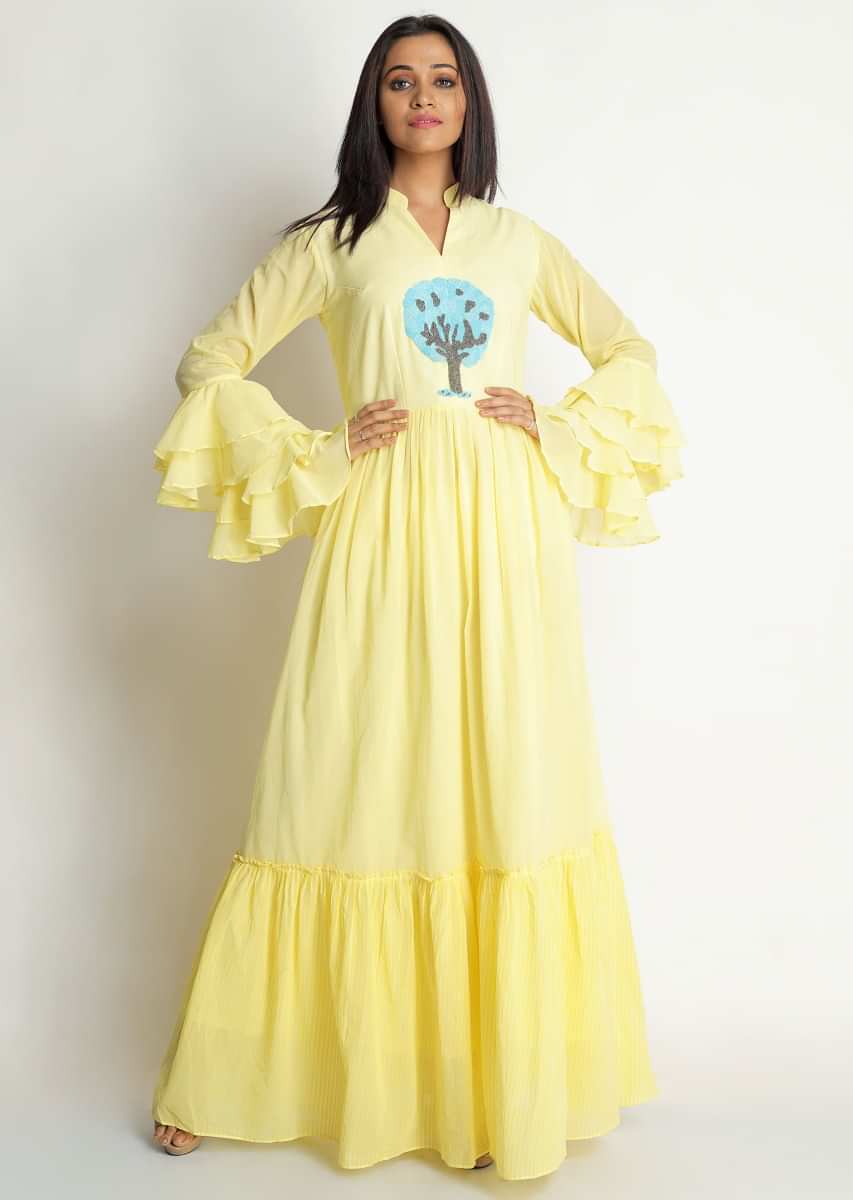 Light yellow tunic dress with blue and grey motif embroidered butti