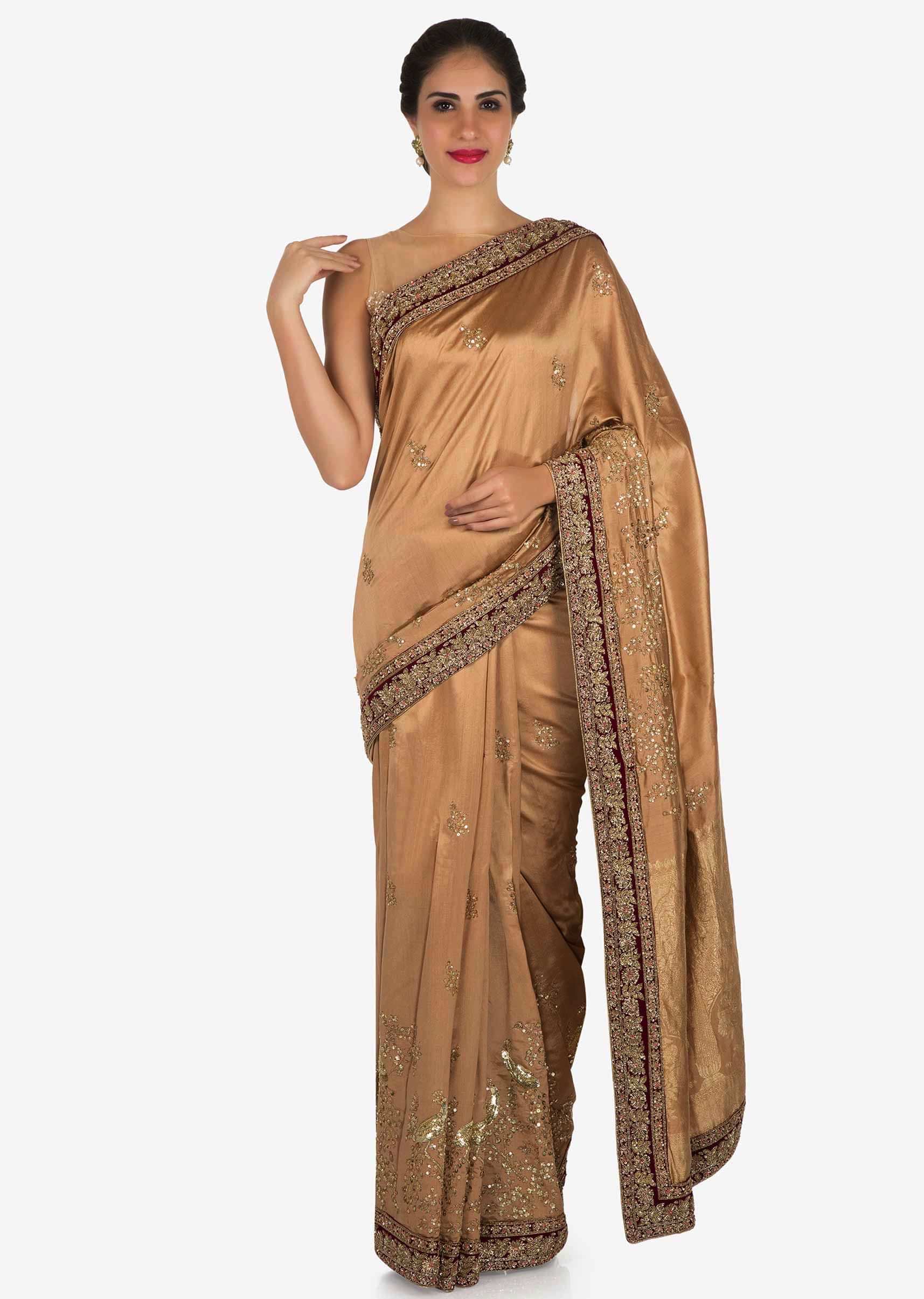 Light brown saree in cotton silk embellished in heavy sequin bird motif work only on Kalki