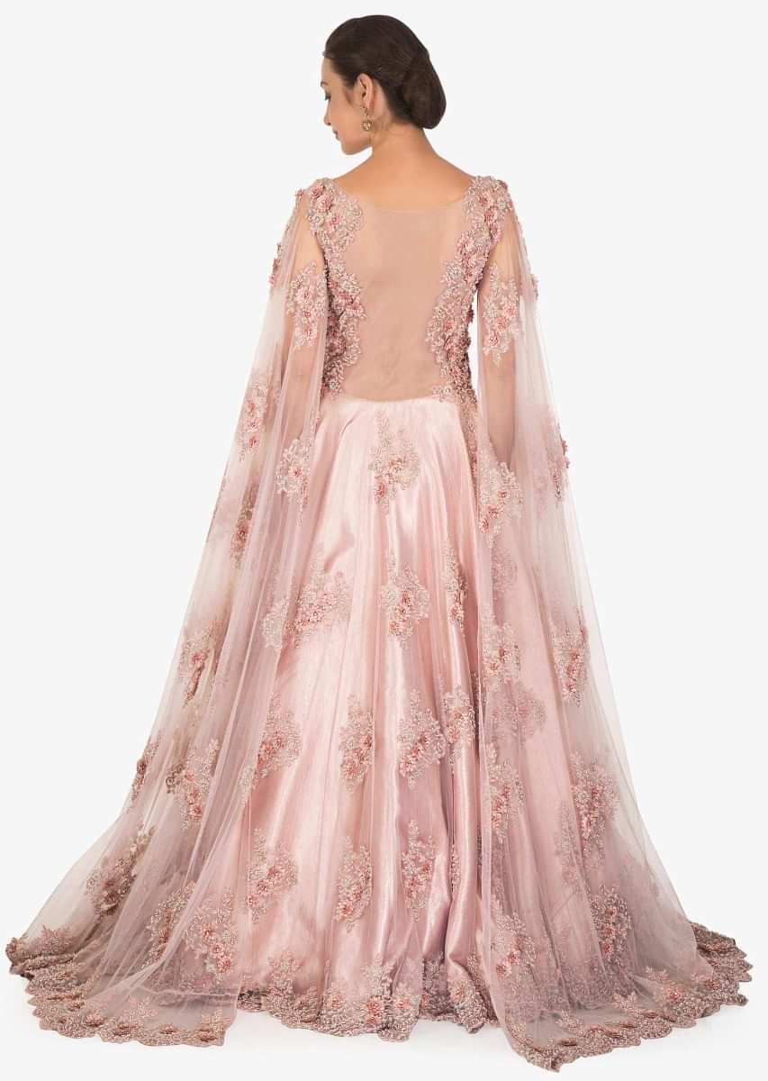 Light lilac pink gown in embroidered net with fancy sleeve