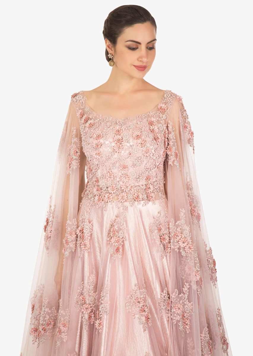 Light lilac pink gown in embroidered net with fancy sleeve