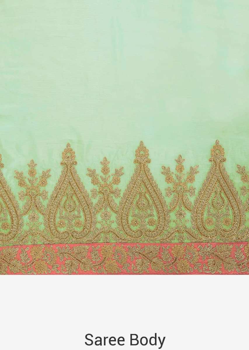 Light pista green saree in satin chiffon with zari and cut dana embroidered butti and border only on Kalki