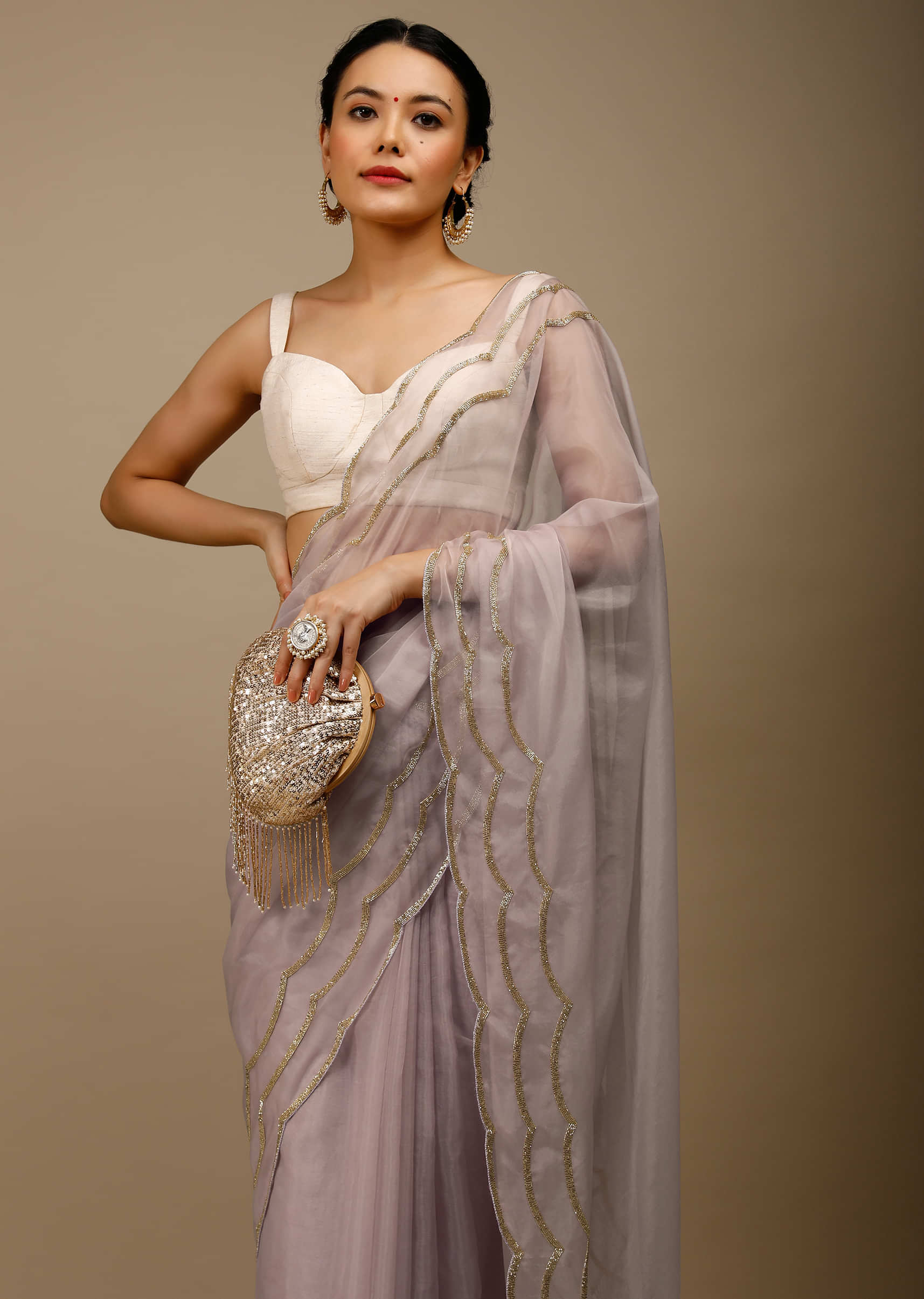 Lilac Ash Saree In Organza With Cut Dana Embroidered Scallop Cut Border And Moti Fringes On The Pallu  