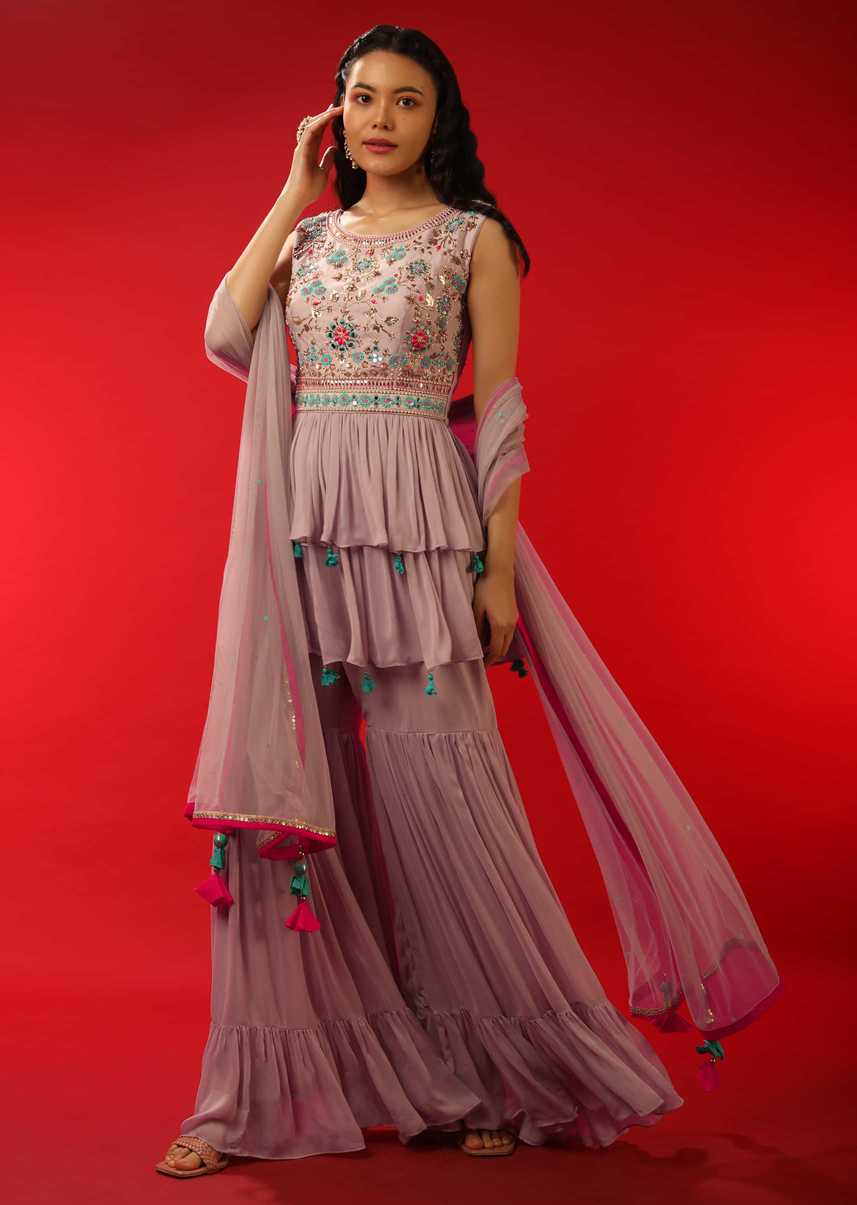 Lilac Sharara And Peplum Suit With Multi Colored Sequins And Mirror Able Work In Floral Motifs  