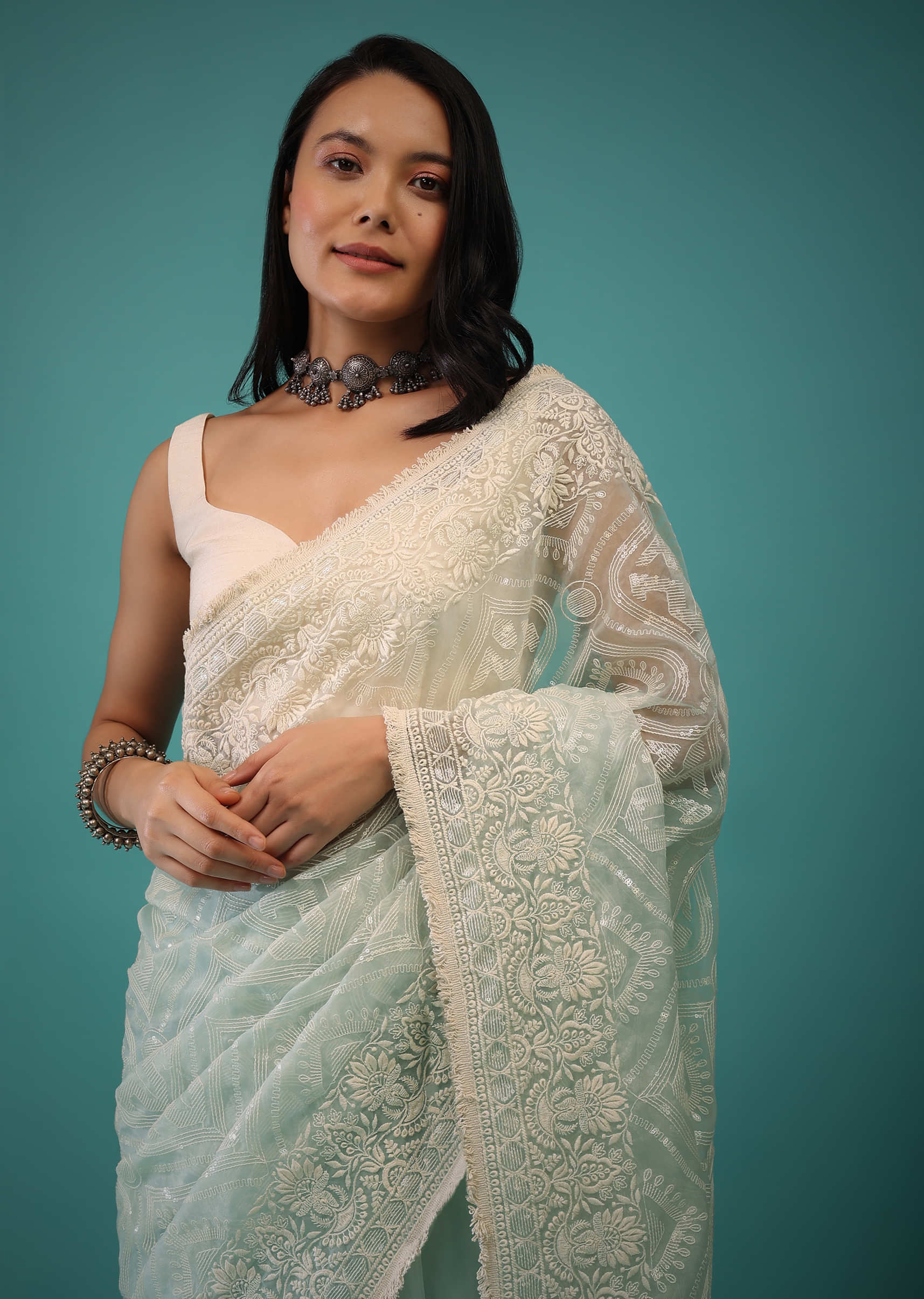 Lily Blue Organza Saree In Moroccan Lucknowi Thread Work, It Has Lacework Fringes On The Border