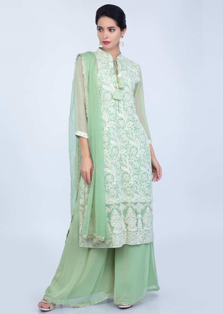 Lime green lucknowi thread embroidered georgette suit with matching palazzo and chiffon dupatta only on Kalki