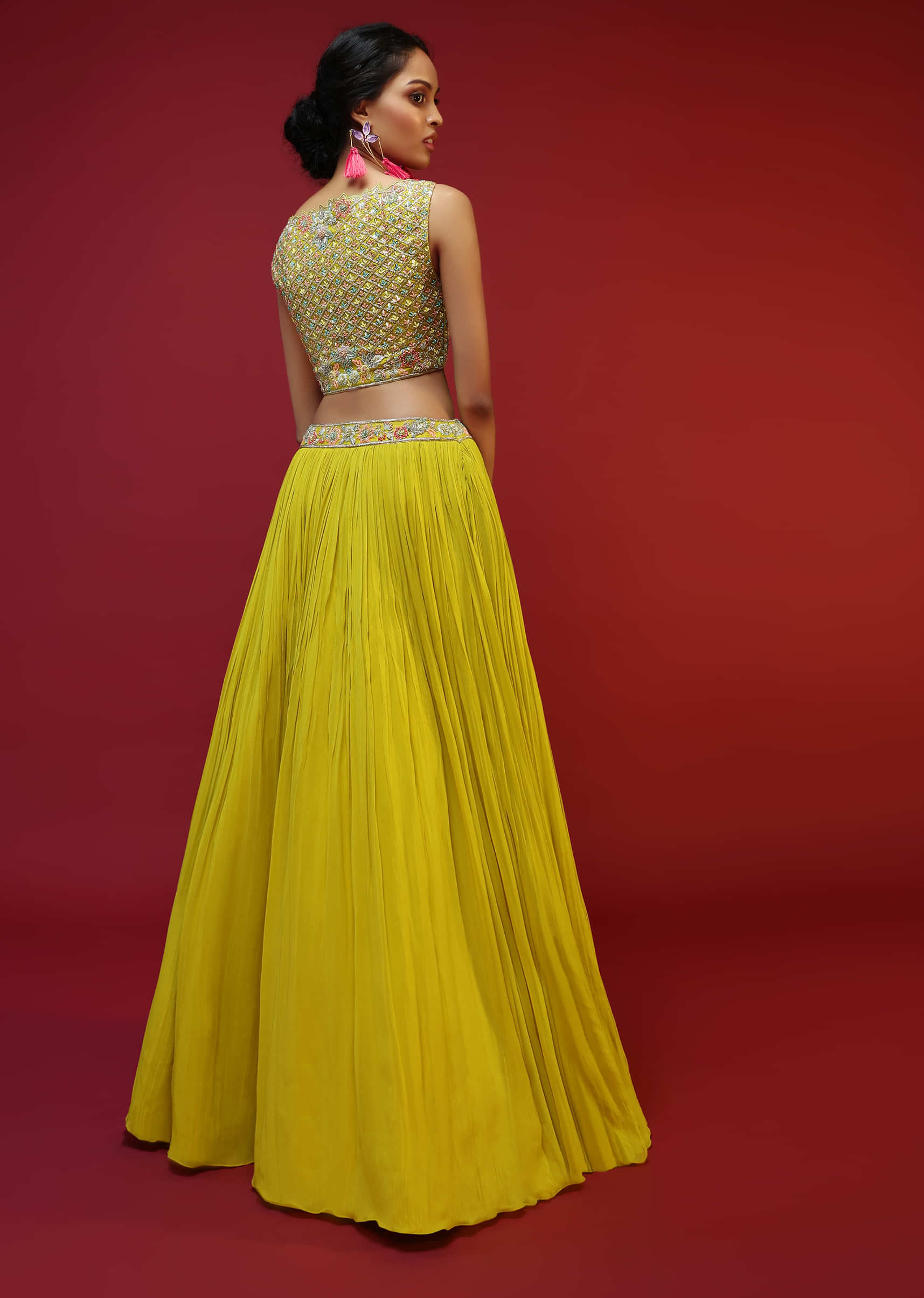 Lime Yellow Lehenga Choli With Multi Colored Beads And Sequins Work And A Matching Embroidered Belt At The Waist 
