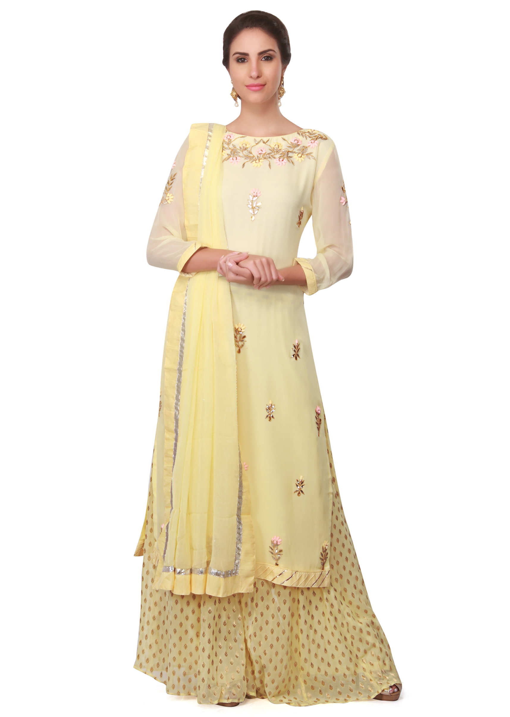 Lime yellow straight suit embellished in resham and gotta lace only on Kalki