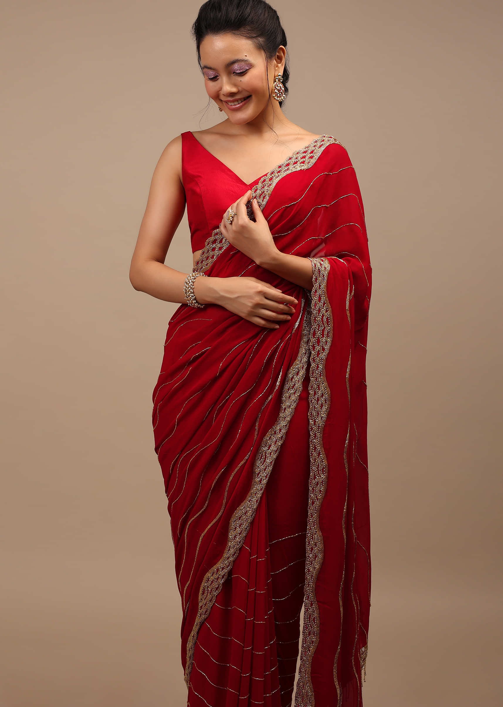 Lipstick Red Georgette Saree Adorned With Golden Zardozi Embroidery & Detailing, And Cut Dana Fringes