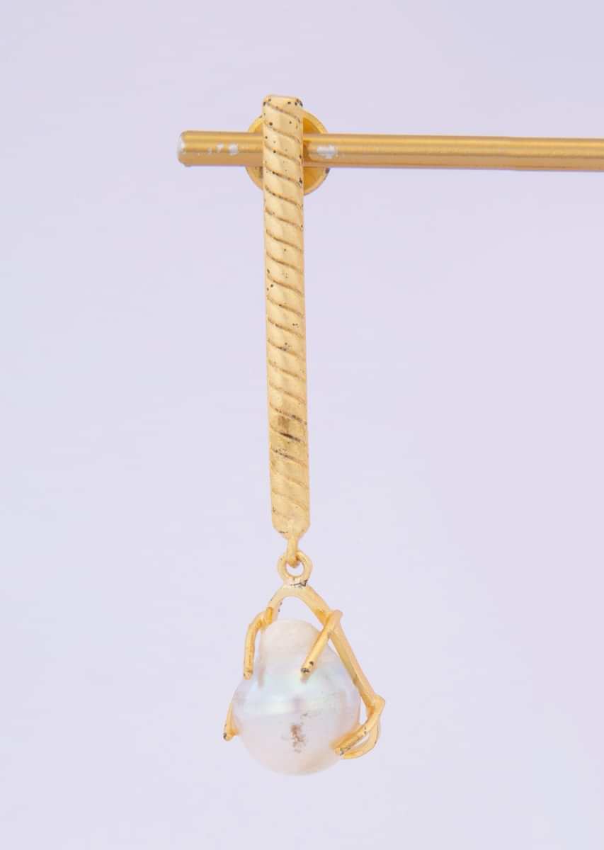 Long tassel earring beautified with mother of pearls at the edges only on kalki