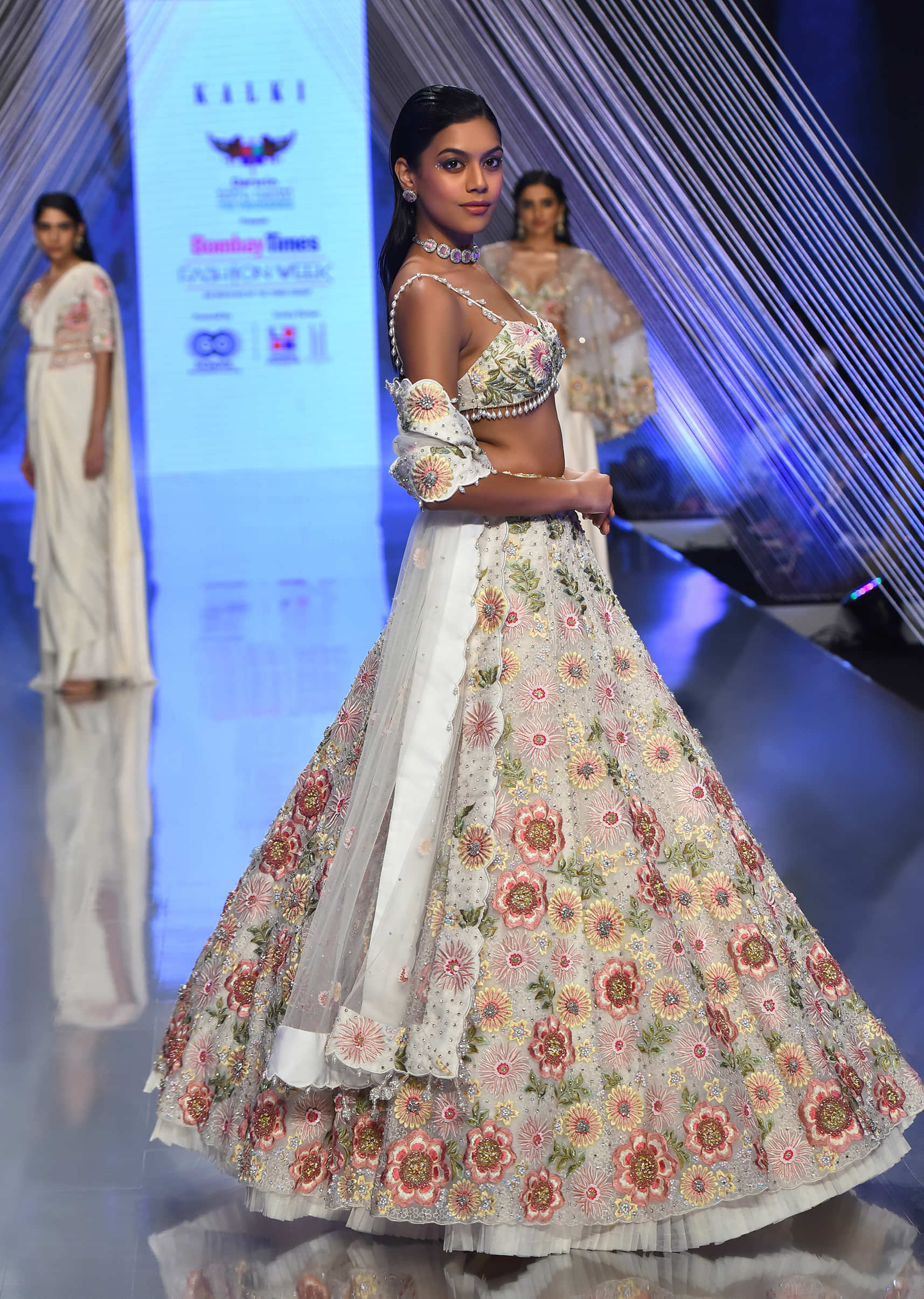Cream Lehenga With A Crop Top In Moti Embroidery, Crafted In Organza With 3D Flower Motifs Embroidery