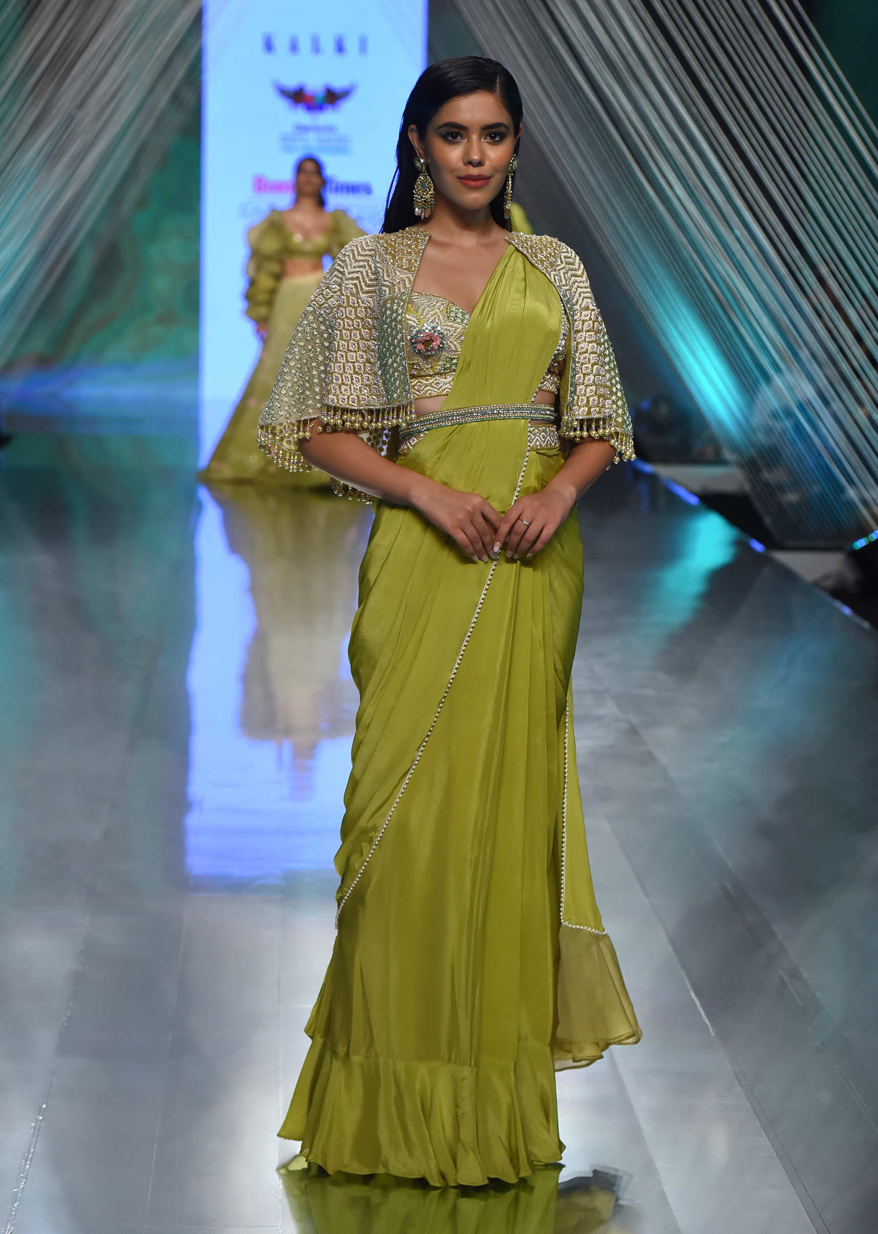 Citrus Ready Pleated Saree With A Net Cape, Crop Top In V Neckline With Cut Out At The Hemline