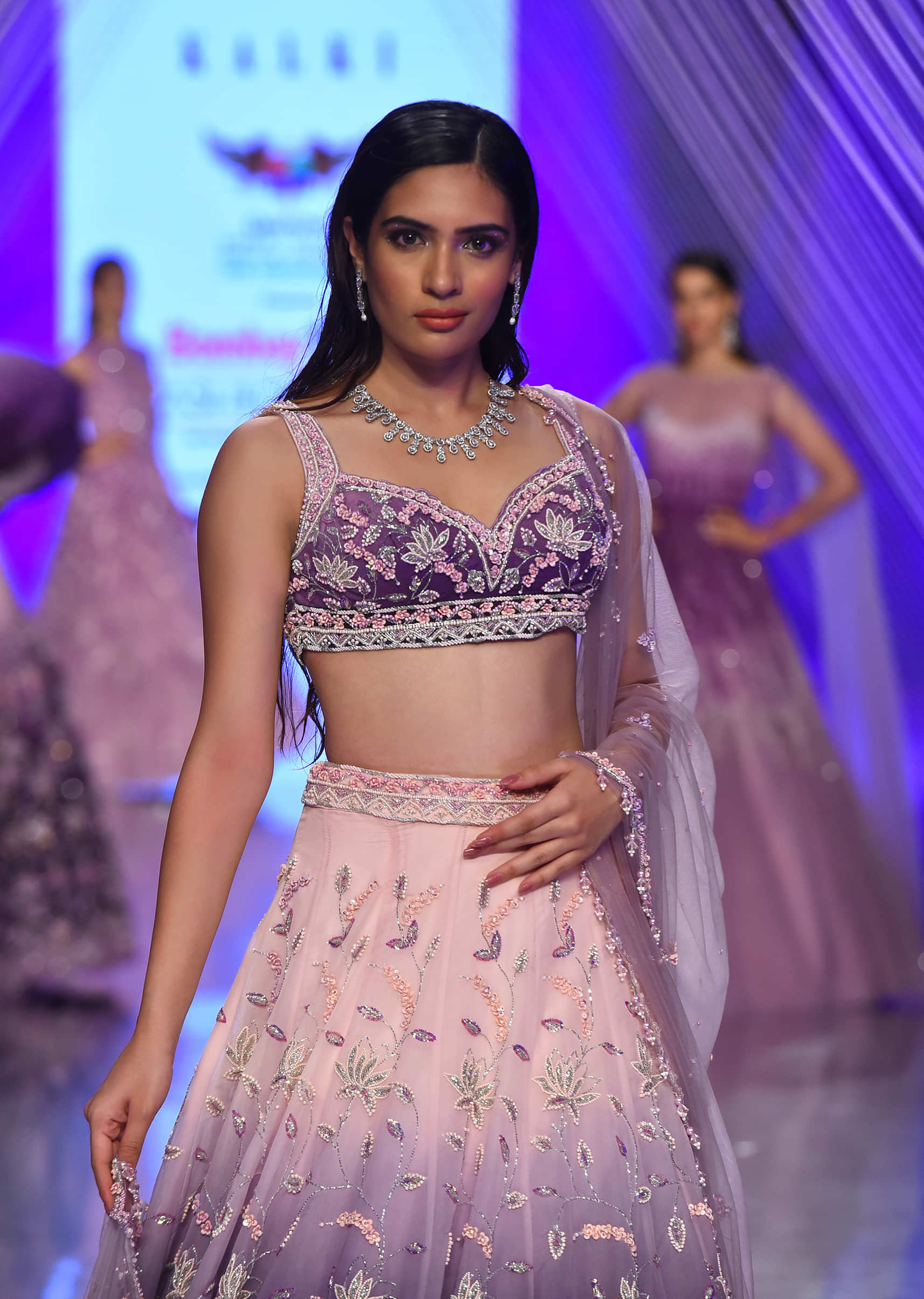 Lavender Ombre Lehenga With The Crop Top In Surface Embroidery