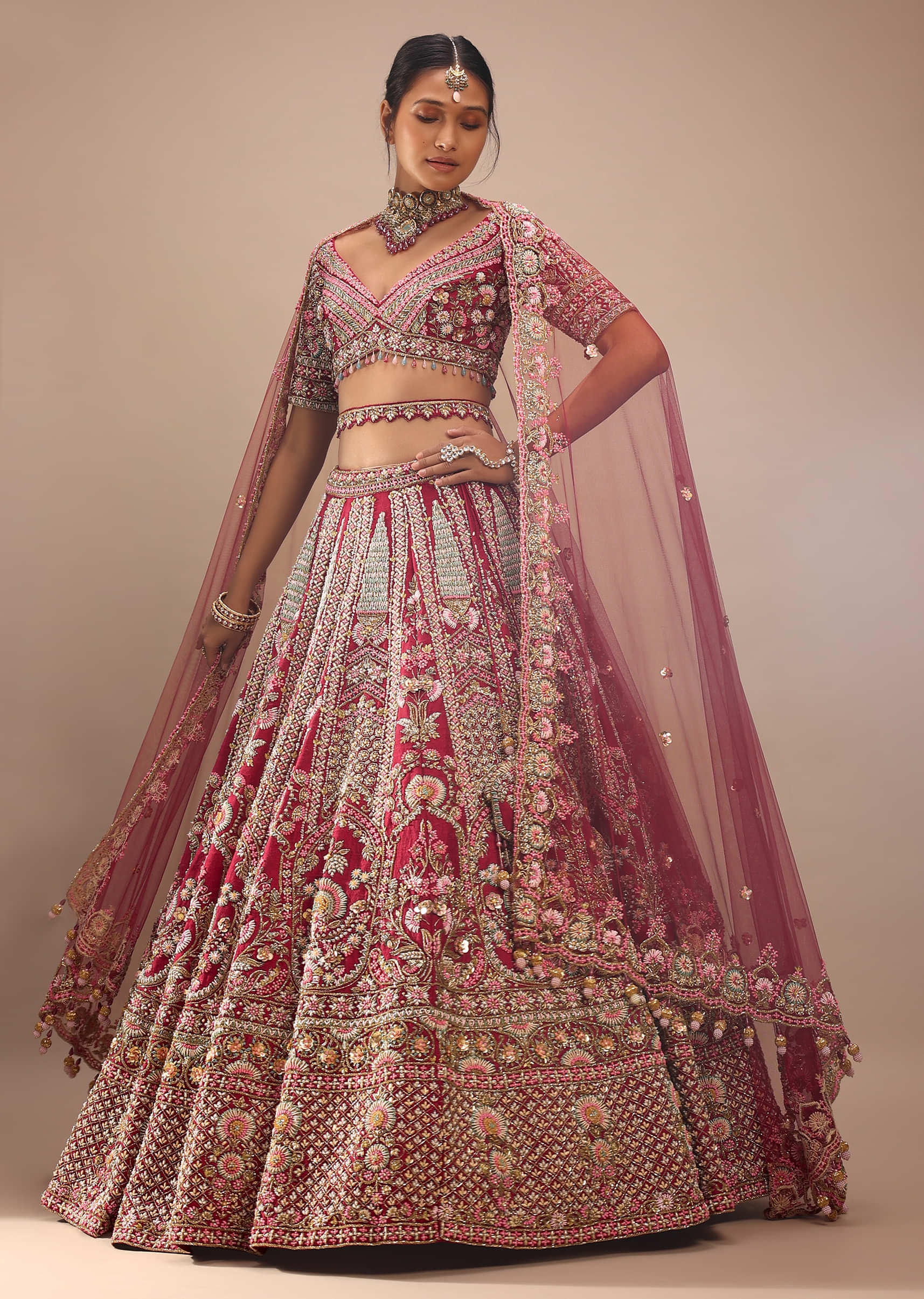 Red Lehenga Choli In Raw Silk With Hand Embroidered Multicolored Heritage Kalis And Embossed Floral Motifs