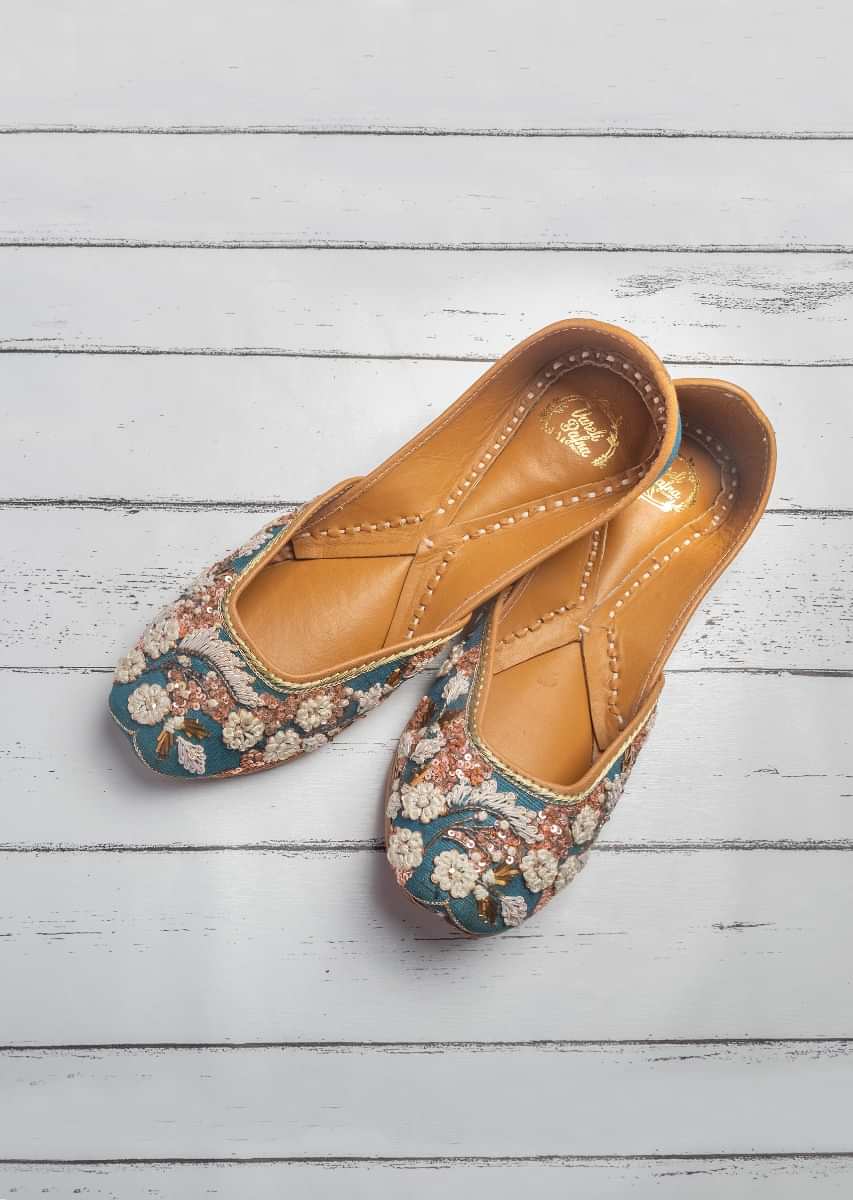 Teal Blue Juttis In Silk With French Knots, Dori And Badla Work In Floral Pattern By Vareli Bafna
