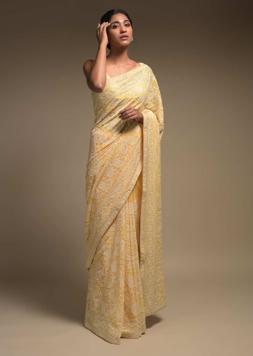 Macaroon Yellow Saree In Georgette Adorned With Lucknowi Thread Embroidery In Paisley Jaal