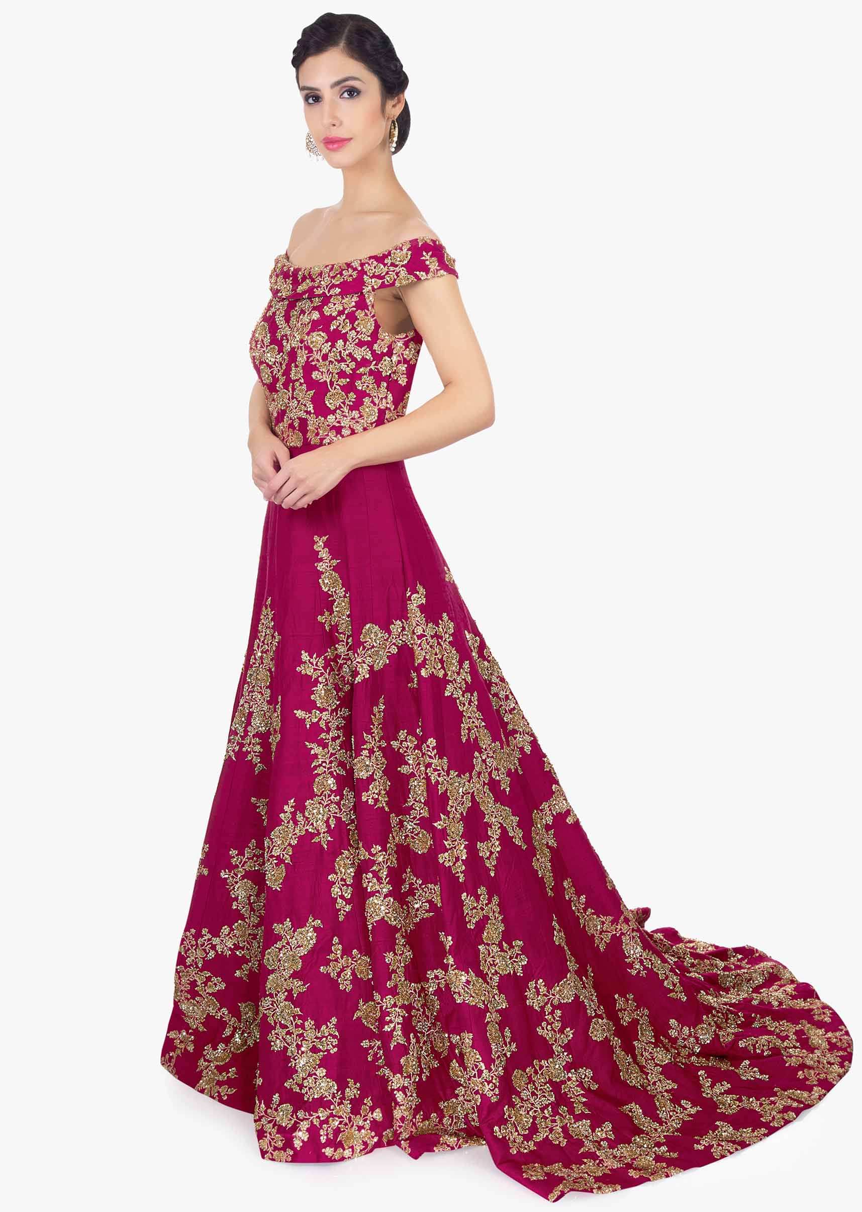  Magenta raw silk embroidered gown with trail at the back